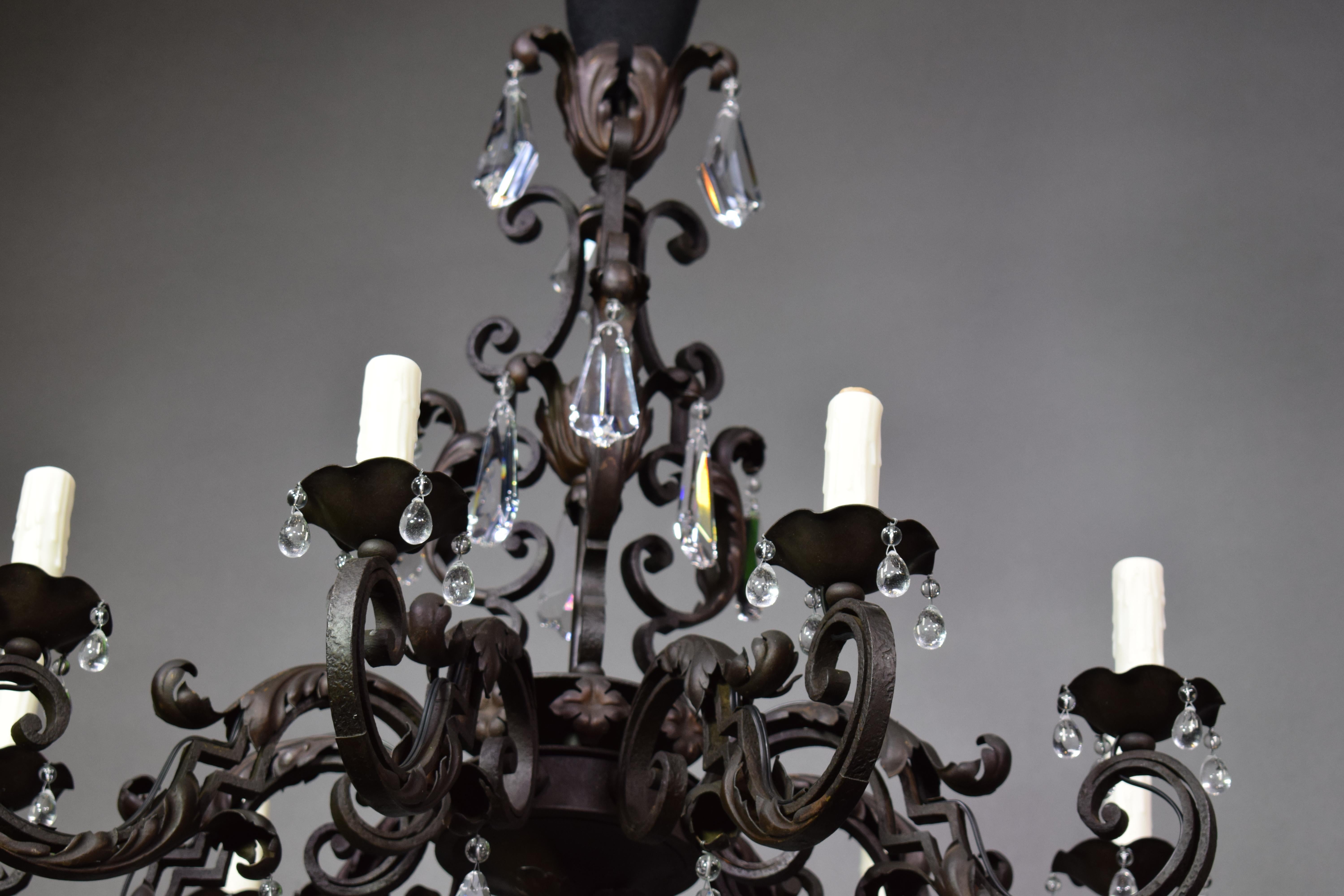 French Iron Chandelier with Crystal Pendalogues For Sale