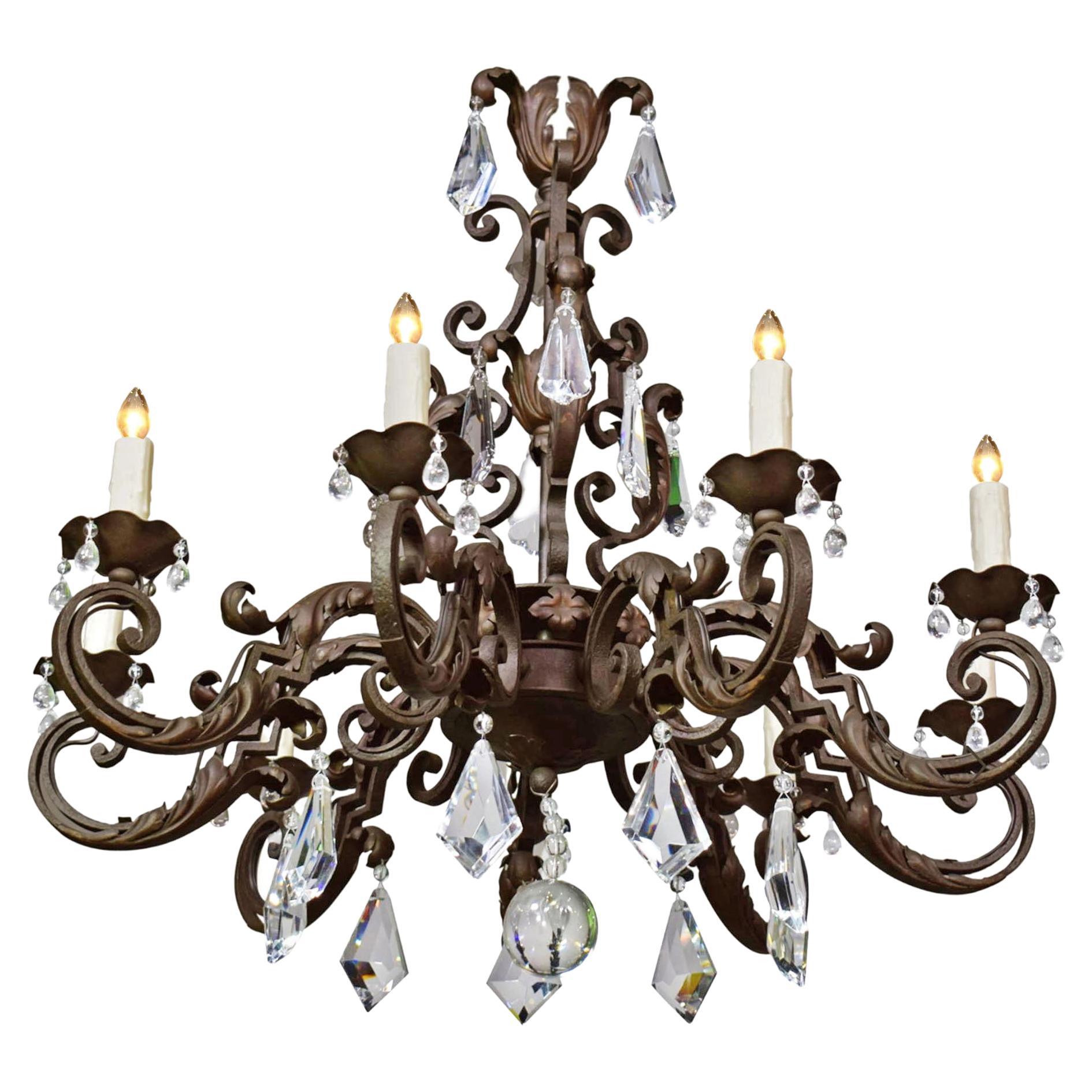 Iron Chandelier with Crystal Pendalogues For Sale