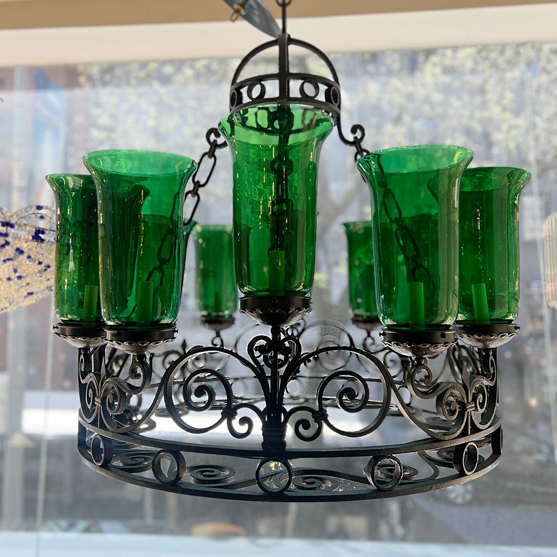 A circa 1950's Italian chandelier with blown glass hurricanes. 12 candelabra lights.

Measurements:
Min drop: 32