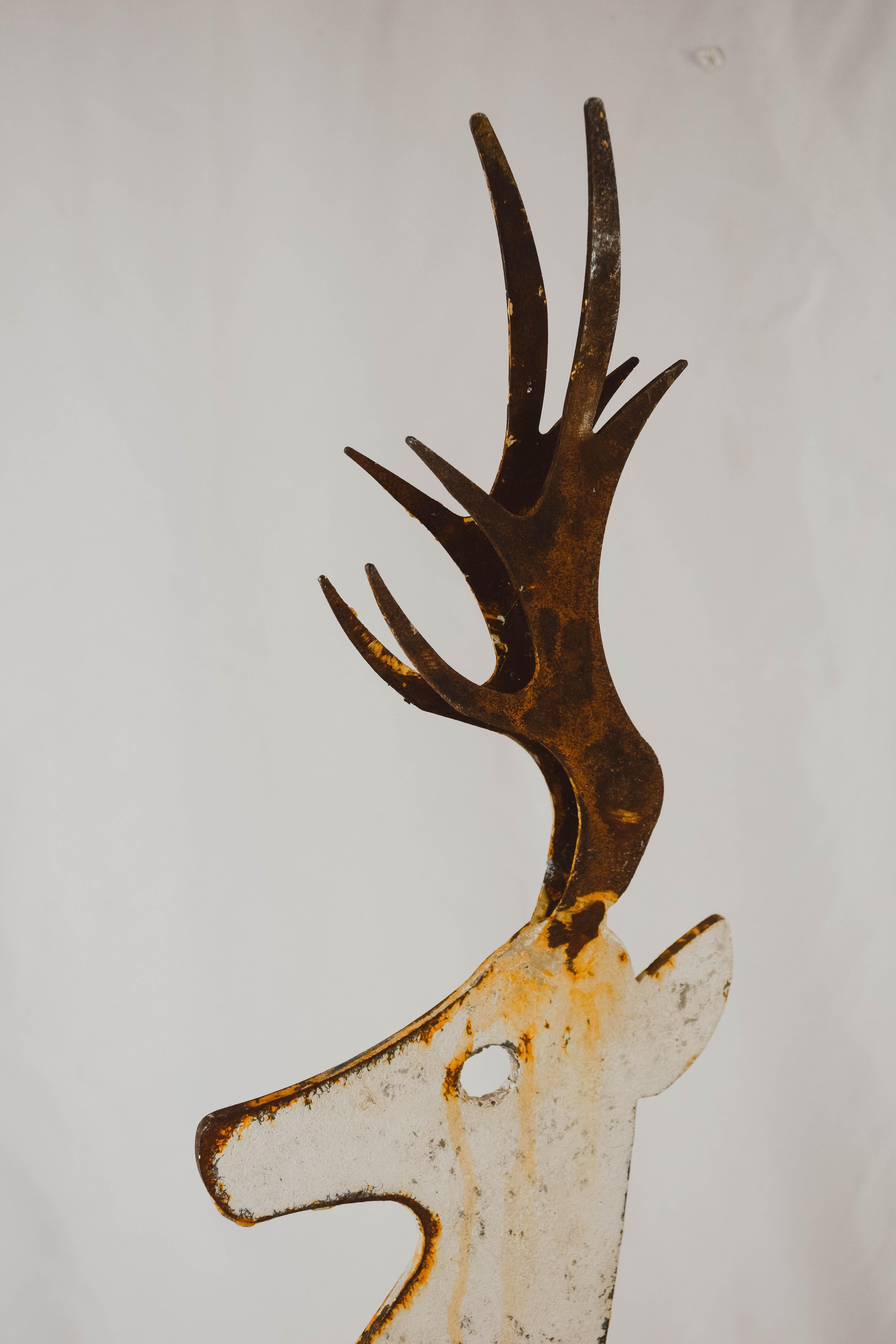 Found in the English countryside, this charming metal deer with worn painted patina is possibly part of an old sign. Wonderful decorative piece for the hunter or your ranch, farm or mountain home.