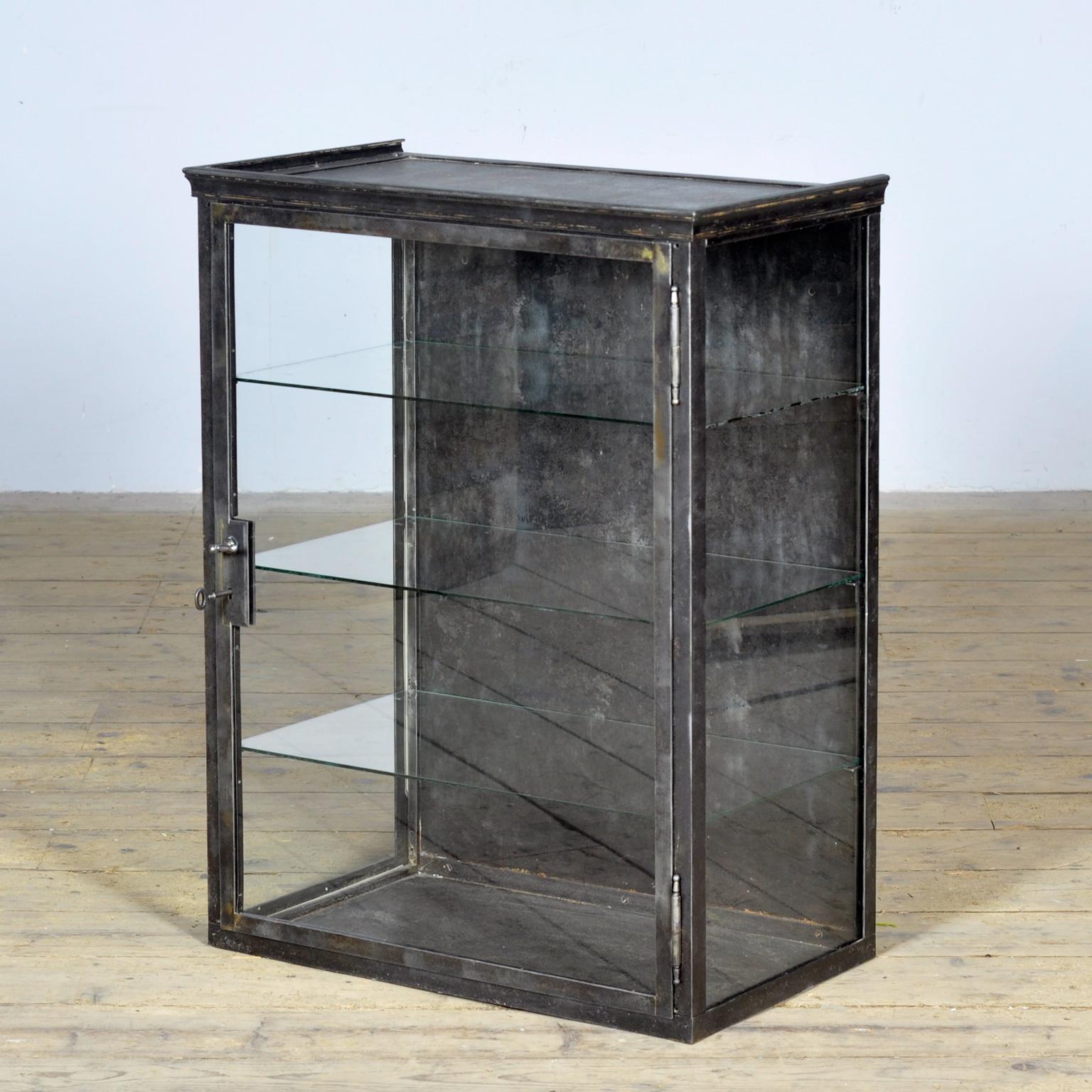 German Iron display cabinet, circa 1920 For Sale