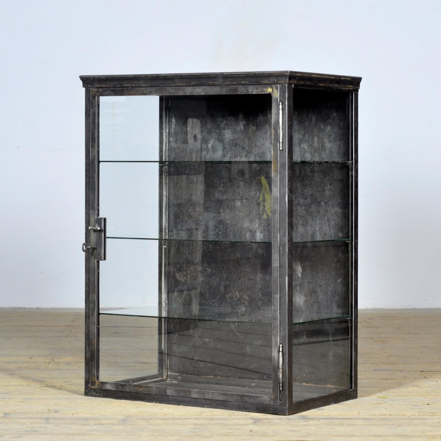 Glass Iron display cabinet, circa 1920 For Sale