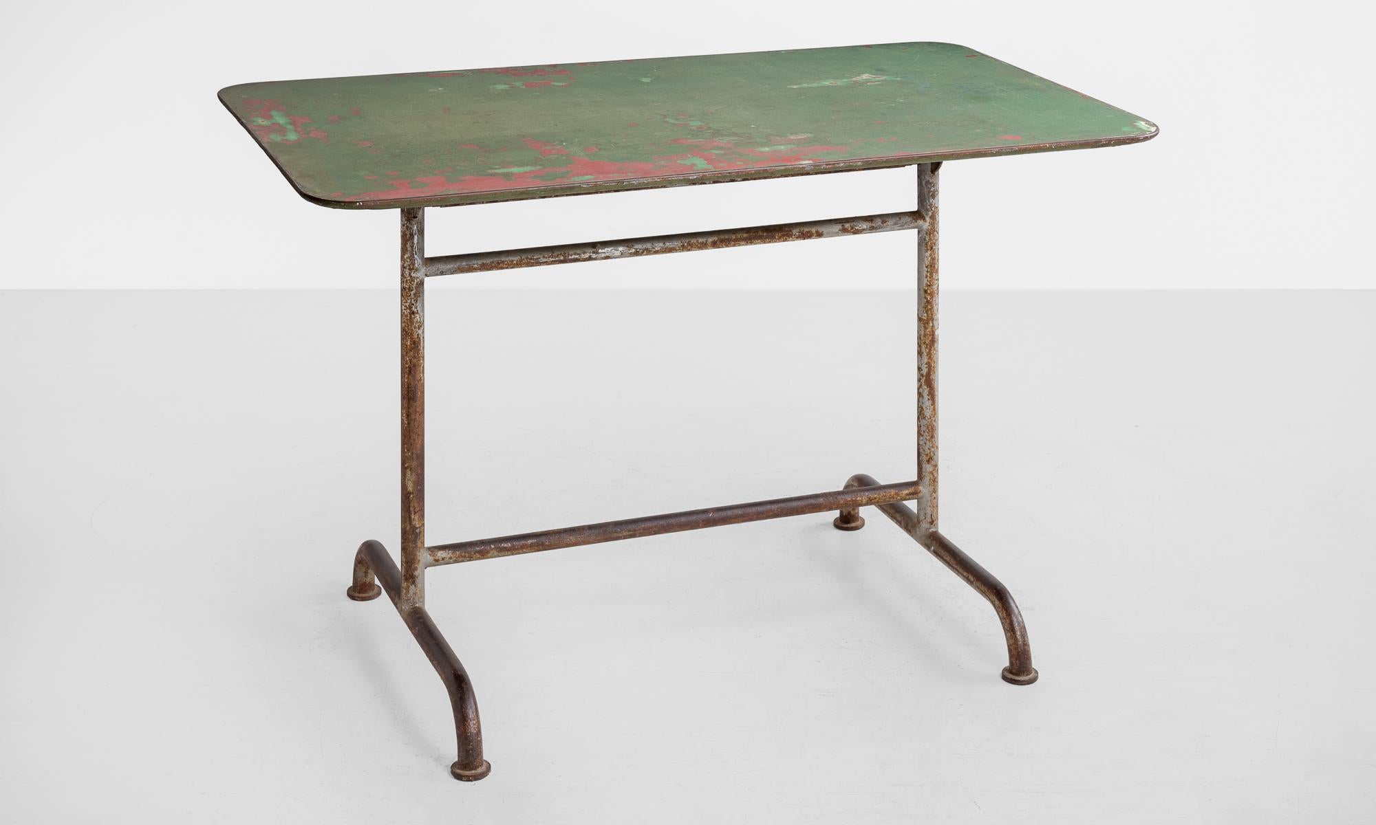 Iron Garden Table, America, circa 1920

Simple form, fold down factory table in original green paint.