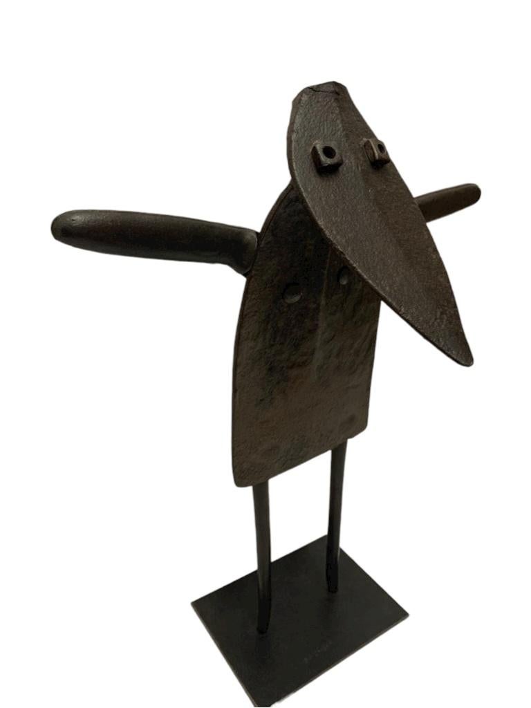 Iron figurine signed by Didier Bazille on the base plate. Constructivism piece with eyes made out of screws. 

Property from esteemed interior designer Juan Montoya. Juan Montoya is one of the most acclaimed and prolific interior designers in the