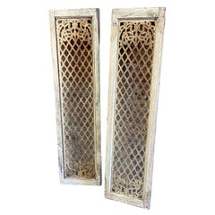 Antique Iron Filigree and Distressed Wood Shutters, a Pair