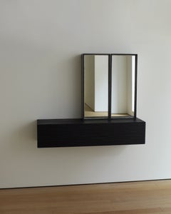 Double Iron-Framed Mirror on Carved and Blackened Oak Shelf 