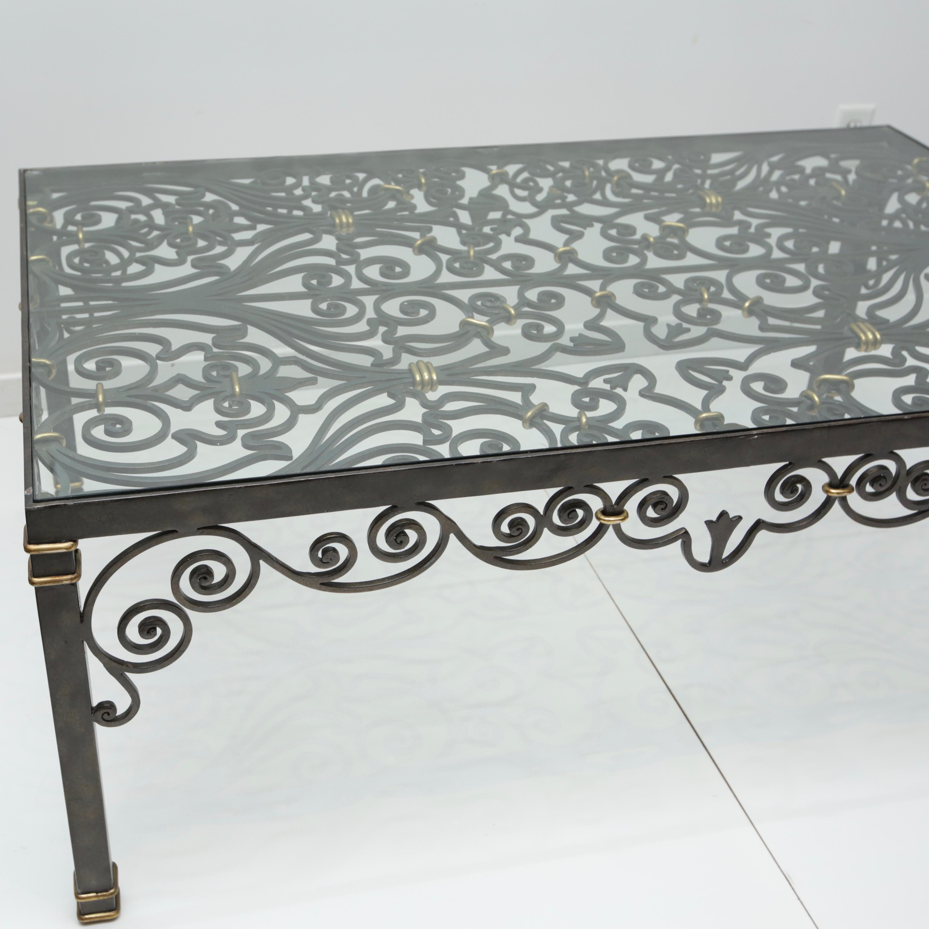 Dramatic iron gate influenced coffee table with a 3/8