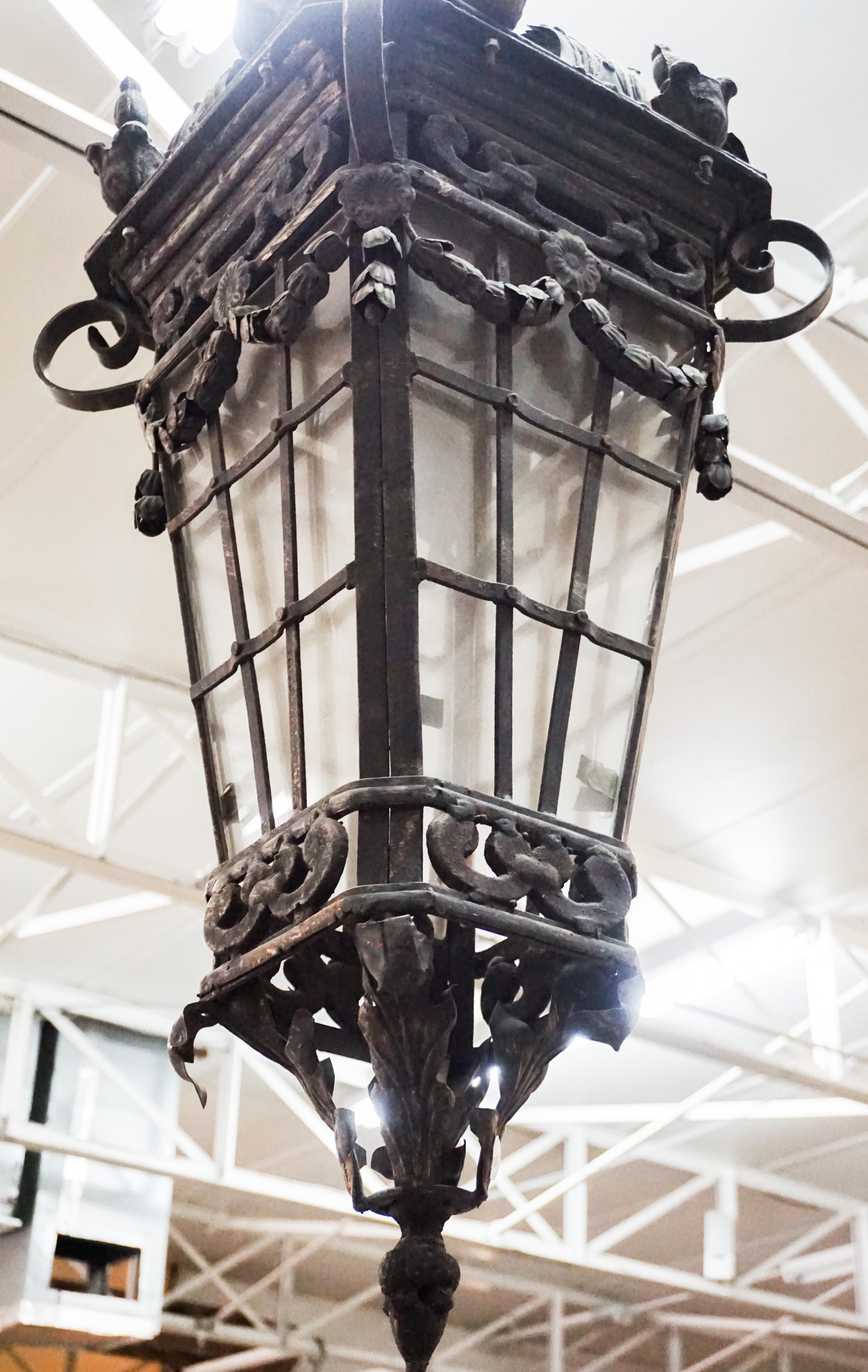 This hanging lantern is made of hand wrought iron and originates from France.

Measurements: 55