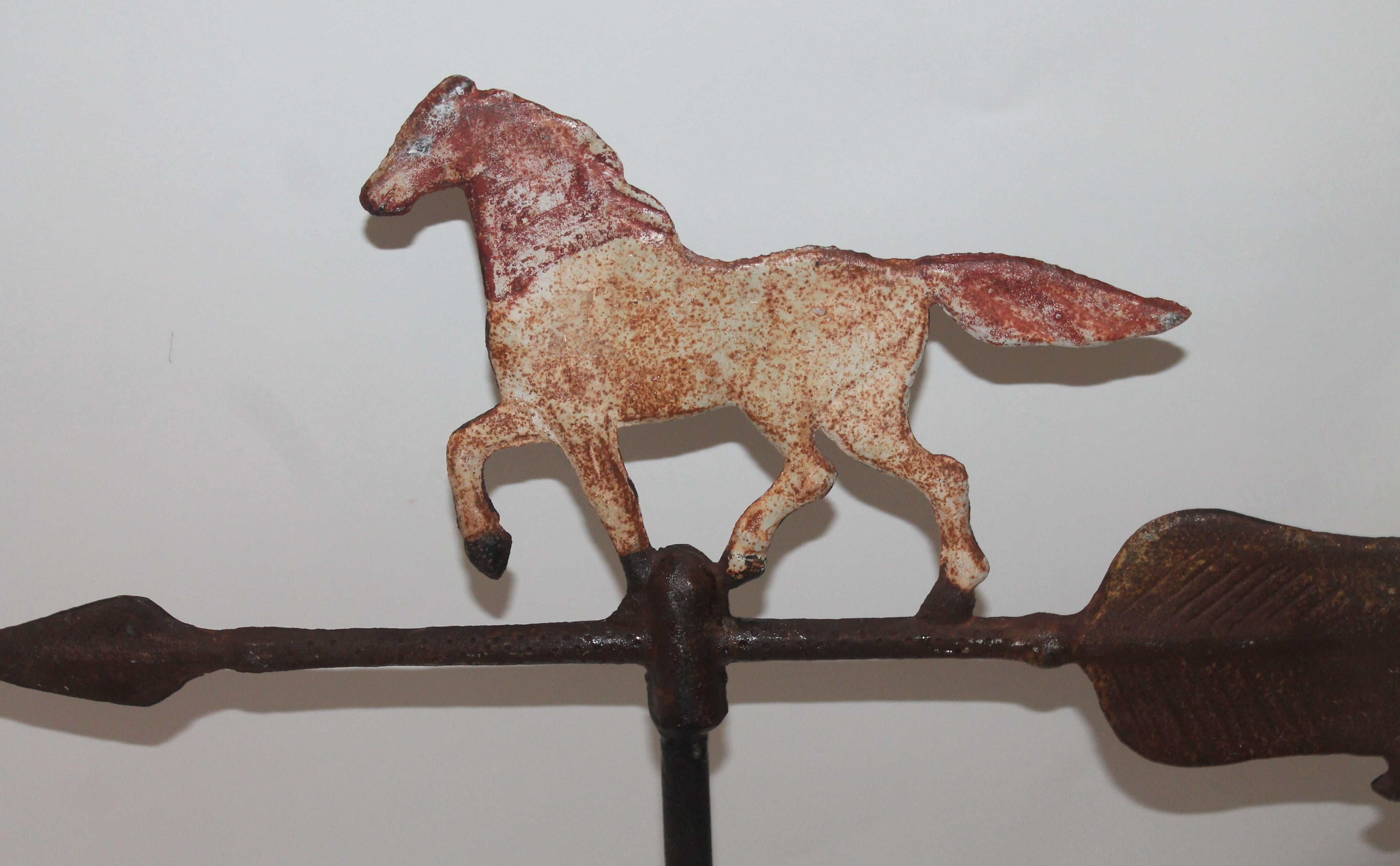 This iron weather vane horse with great paint and patina comes with a tabletop stand. All original paint.
