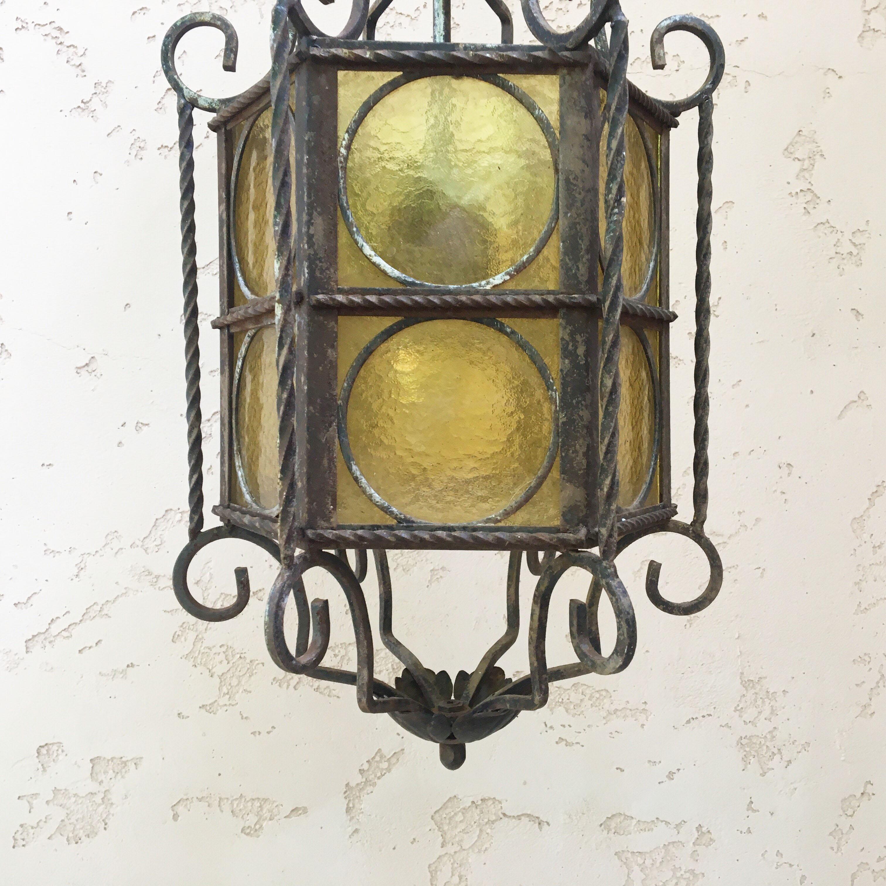 French iron lantern with yellow stained glass, circa 1940.
Wired for US.
Total with the chain / 36