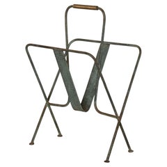 Porte-revues en fer dans le style de Jacques Adnet