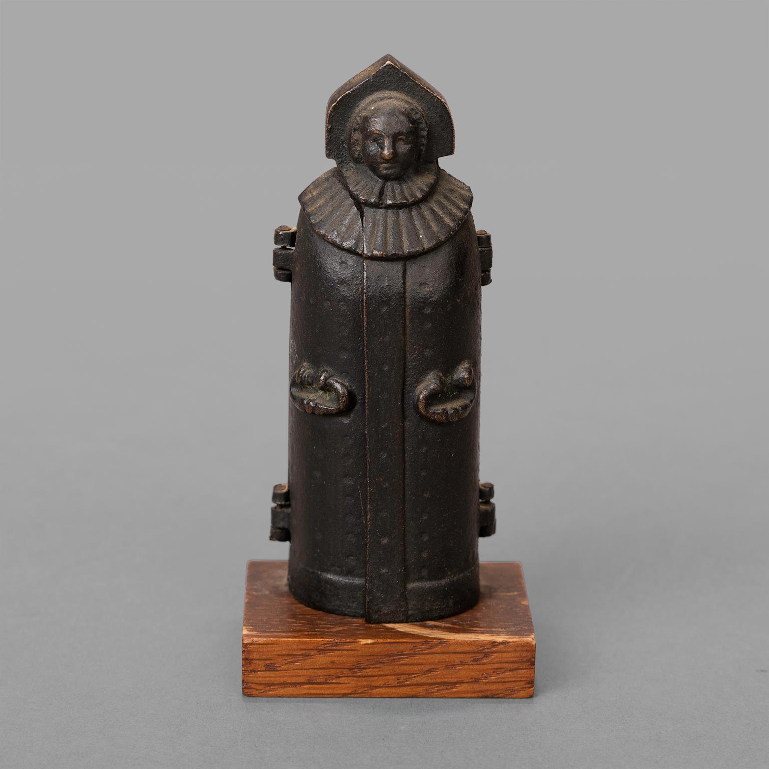 Also called the Nuremberg Virgin, this cast iron miniature represents the infamous torture machine known as the iron maiden. These models were most likely sold as souvenirs during the visit to the castle of Nuremberg in the 1910s.