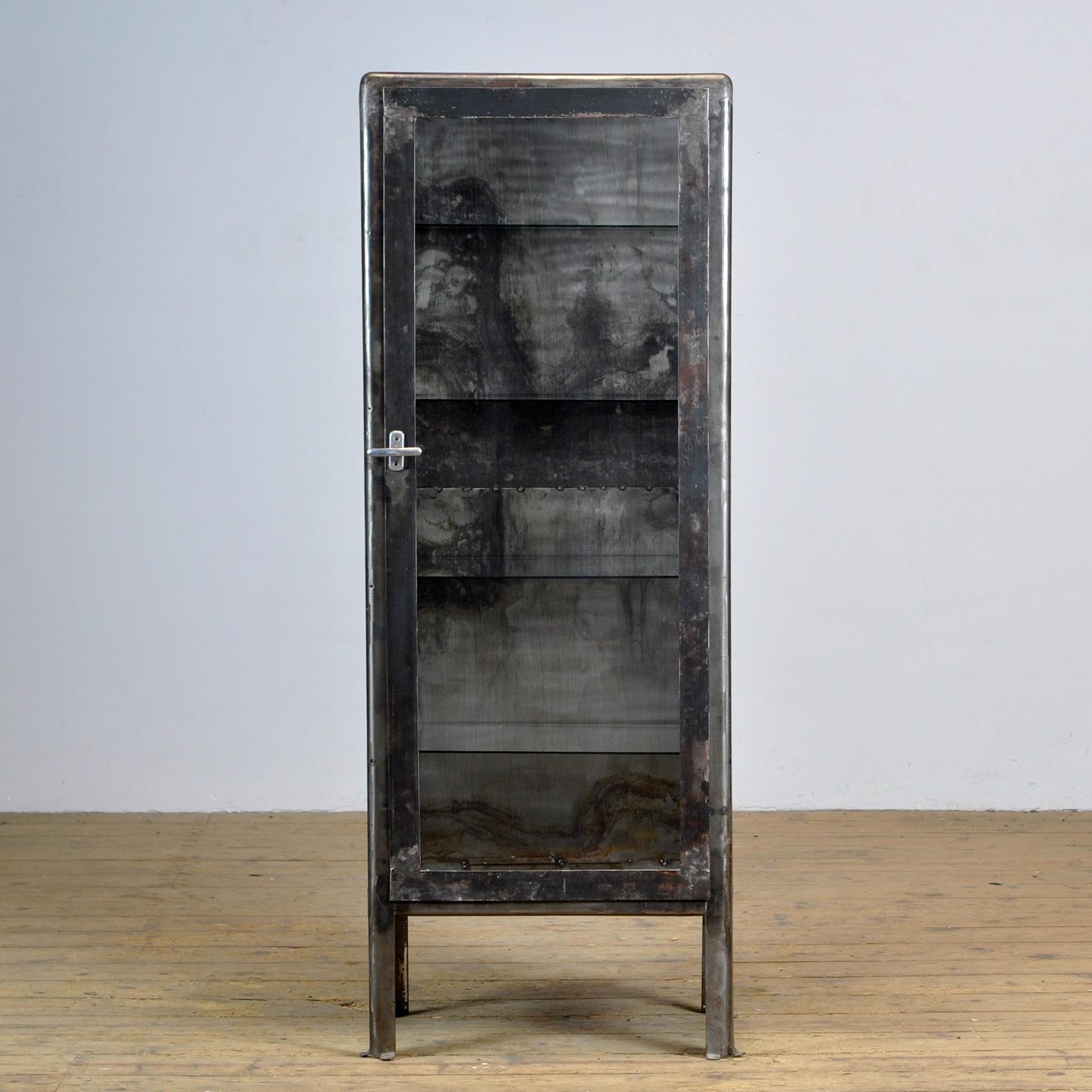 Iron medical cabinet from Ukraine. Produced in the 1970s.
The cabinet has been stripped down to the metal. The cabinet comes with 4 glass shelves.
Space between the shelves is 28 cm.
