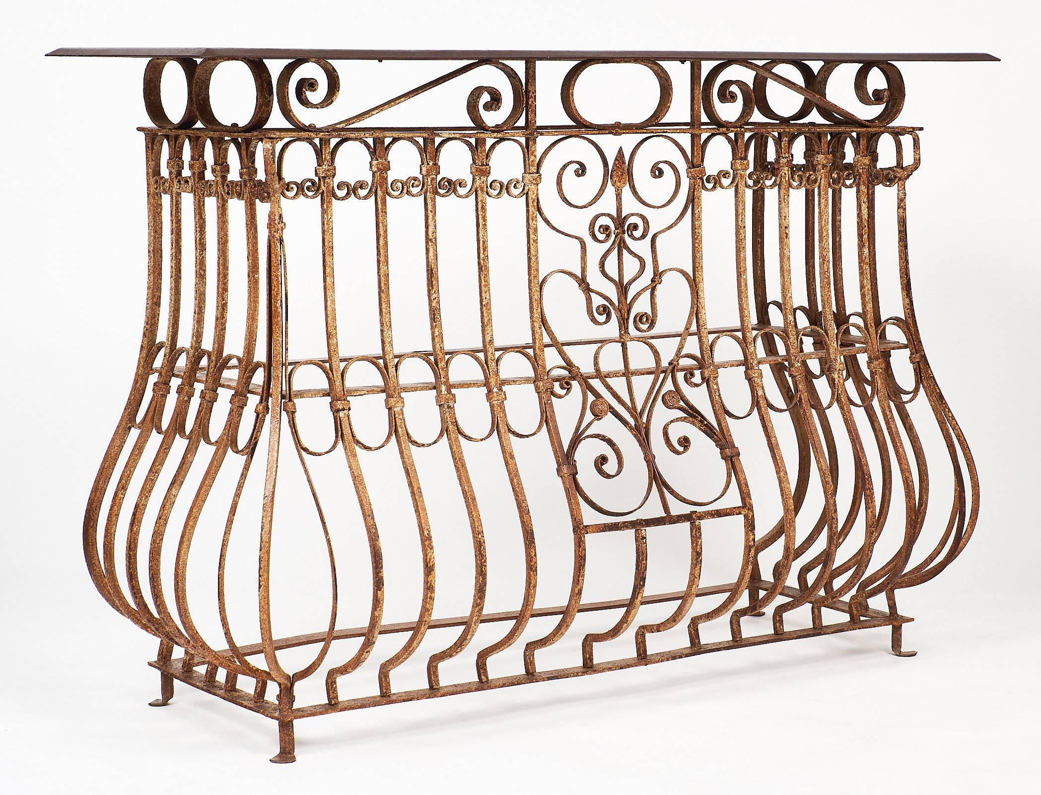 French Napoleon III period iron console table. This piece was made with an antique balcony iron work from Aix en Provence, mounted with an iron top to create a unique and striking console table.