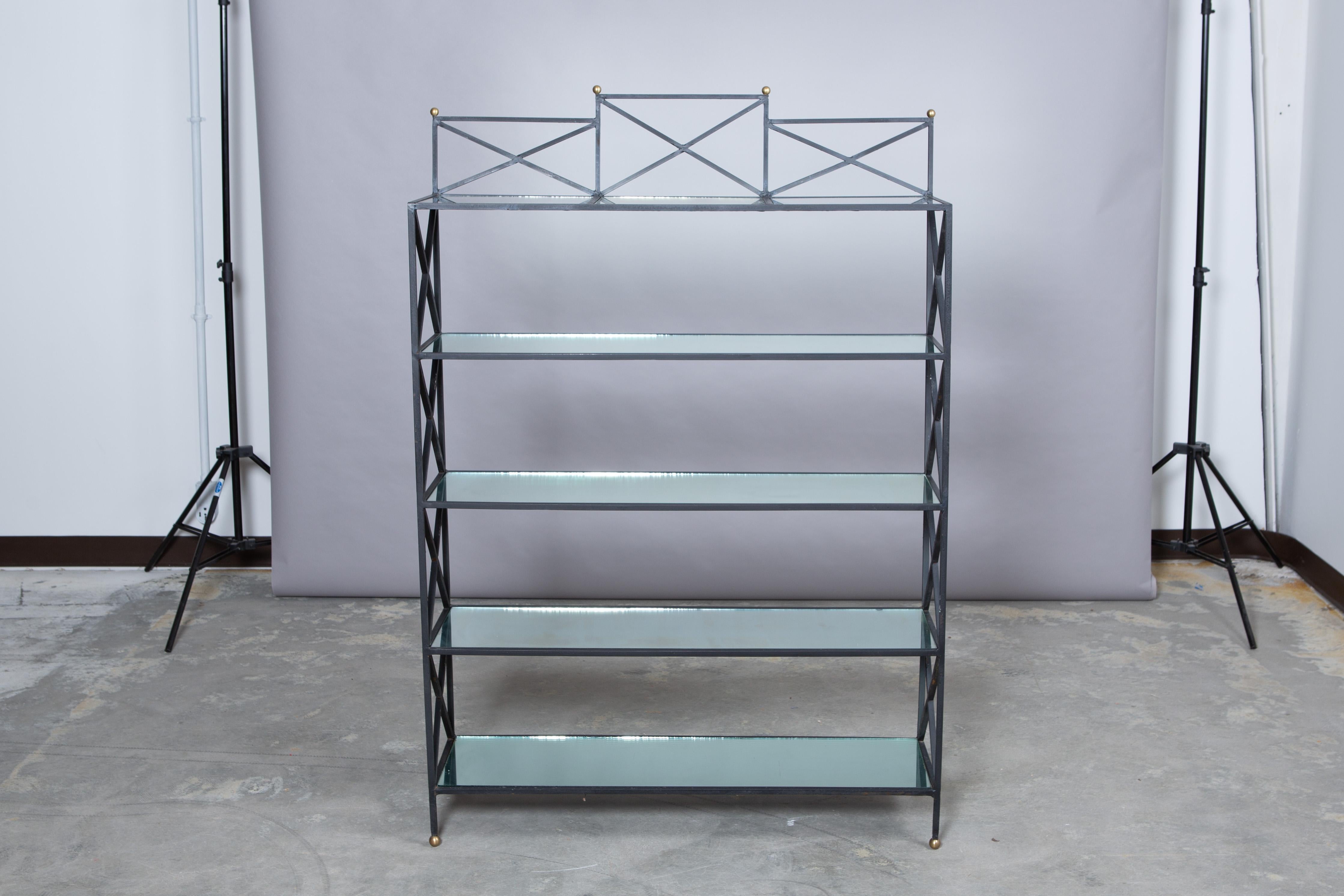 1950s French iron neoclassical style etagere with five mirror shelves, gold ball feet and detail. Light age to mirror. Very good condition for age!
Measures: 53
