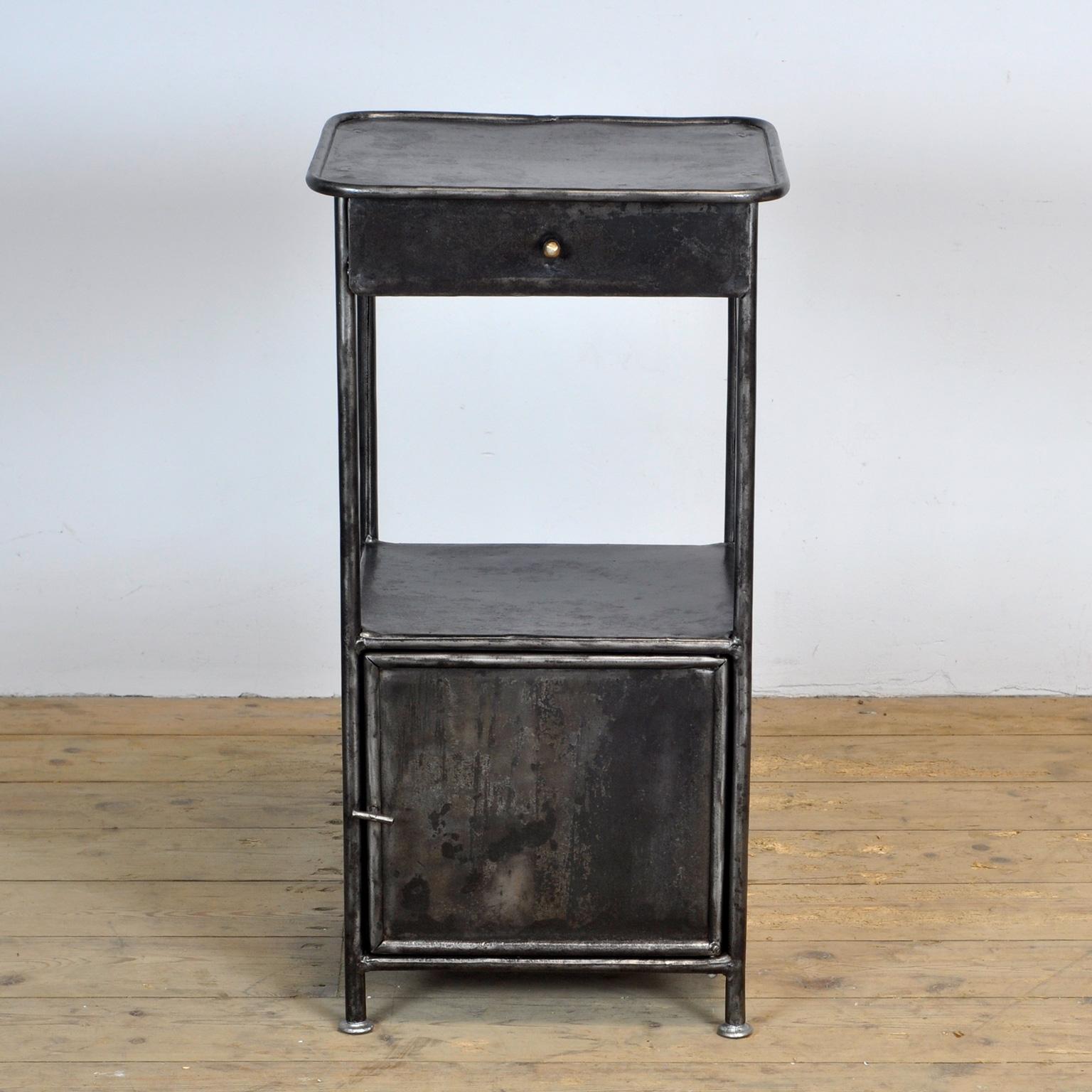 Bedside table made of iron from a hospital in Budapest. Stripped to the metal and polished. Circa 1910.