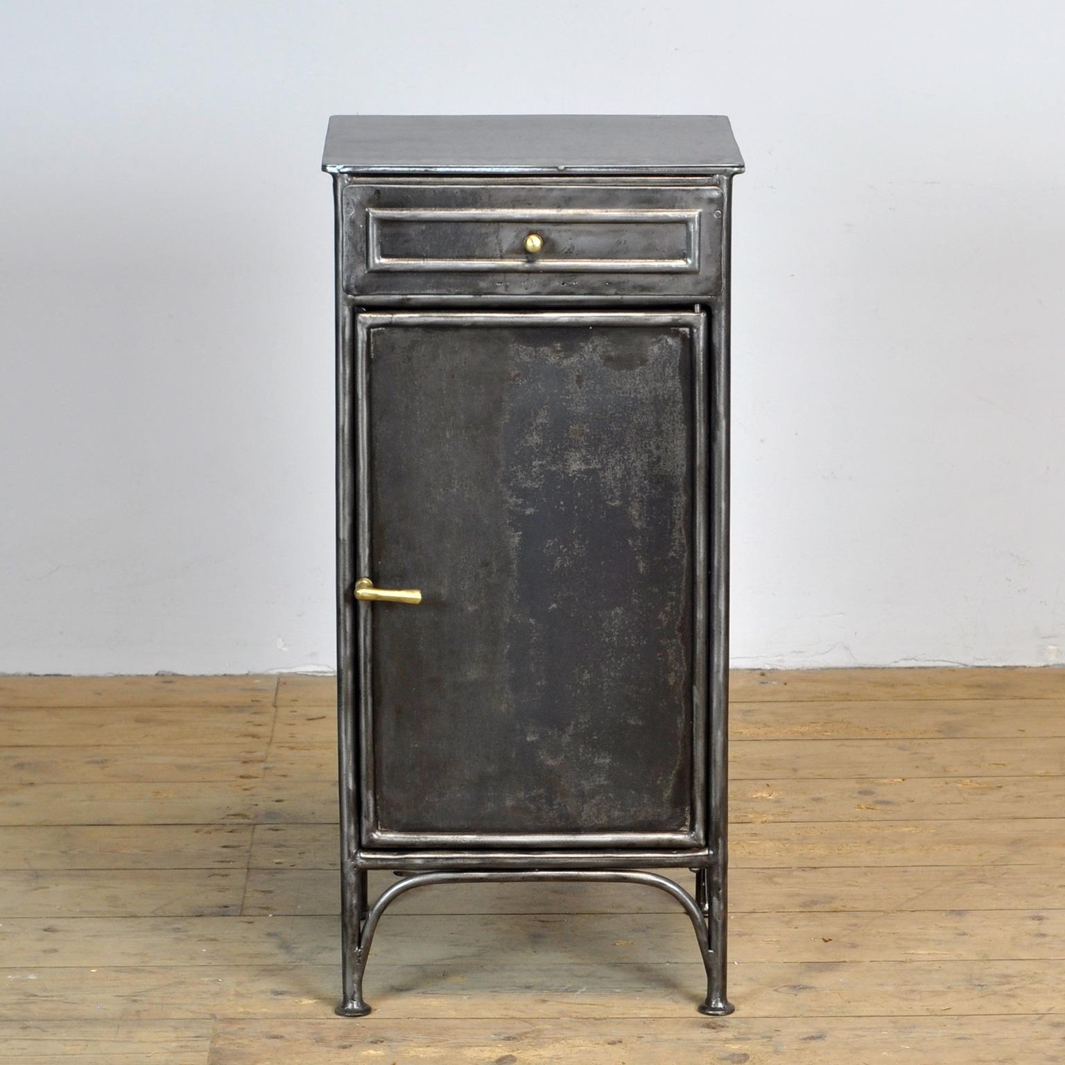 Bedside table made of iron from a hospital in Budapest. Stripped to the metal and polished. Circa 1910.