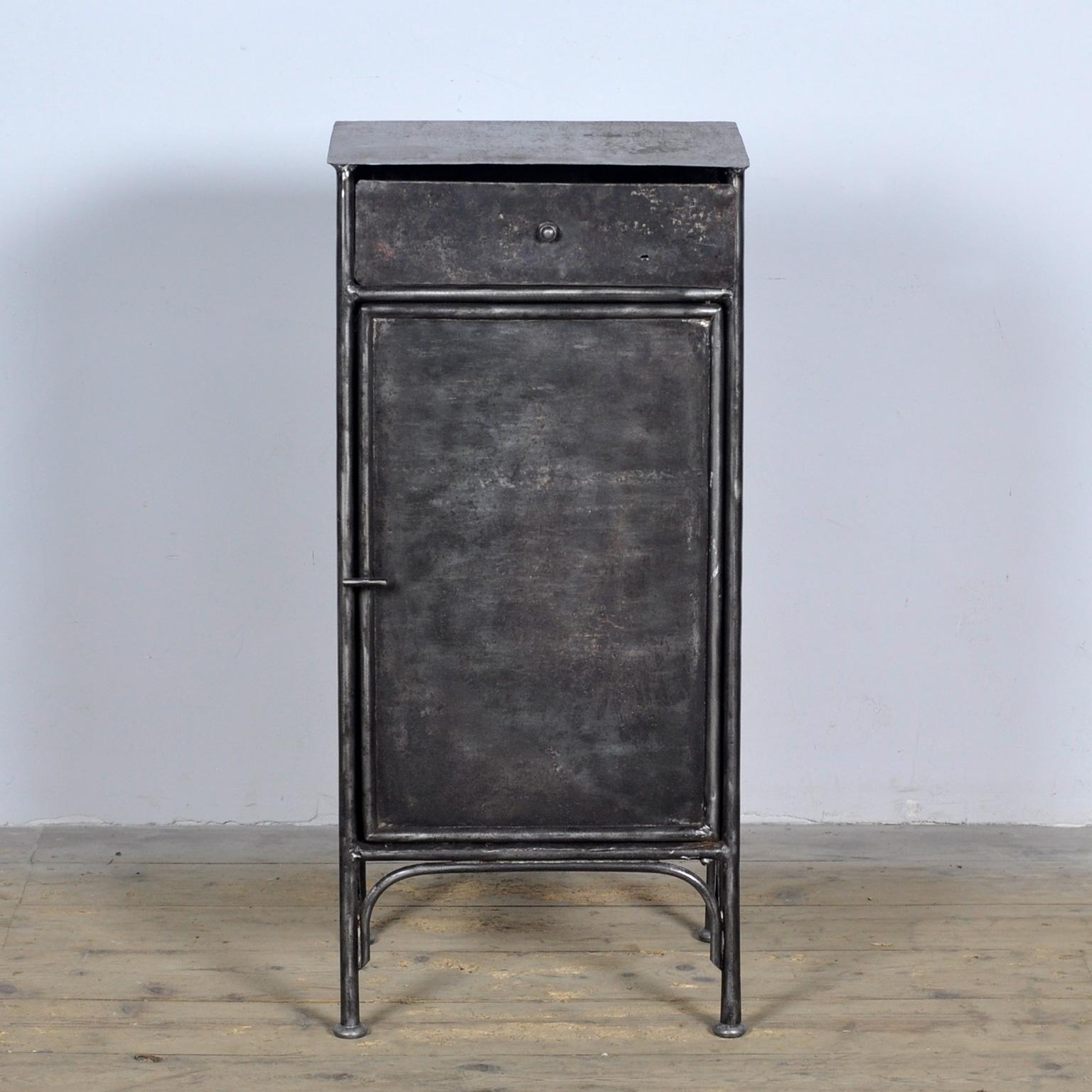 Bedside table made of iron from a hospital in Budapest. Stripped to the metal and polished. Circa 1910.
