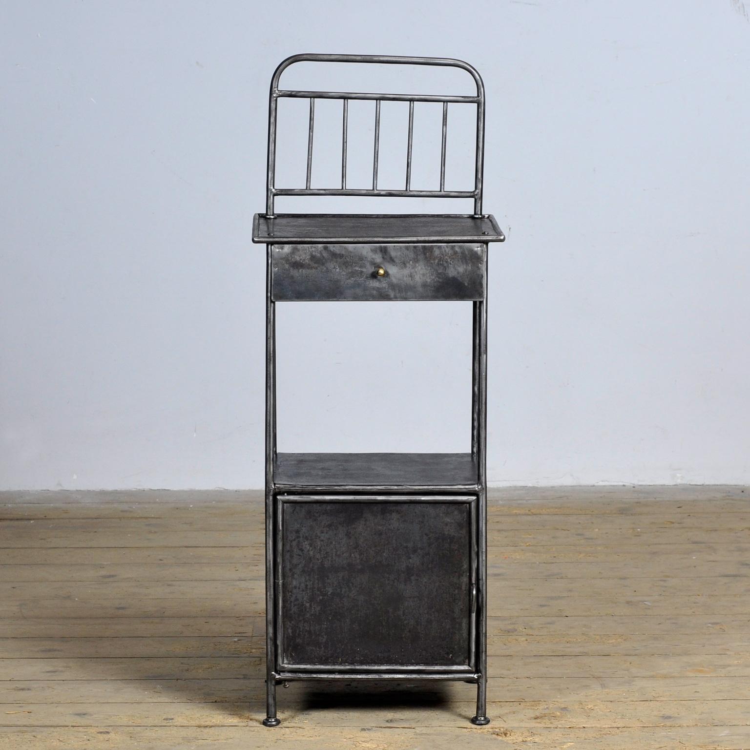 Bedside table made of iron from a hospital in Budapest. Stripped to the metal and polished. Circa 1910.
Top height: 81 cm
