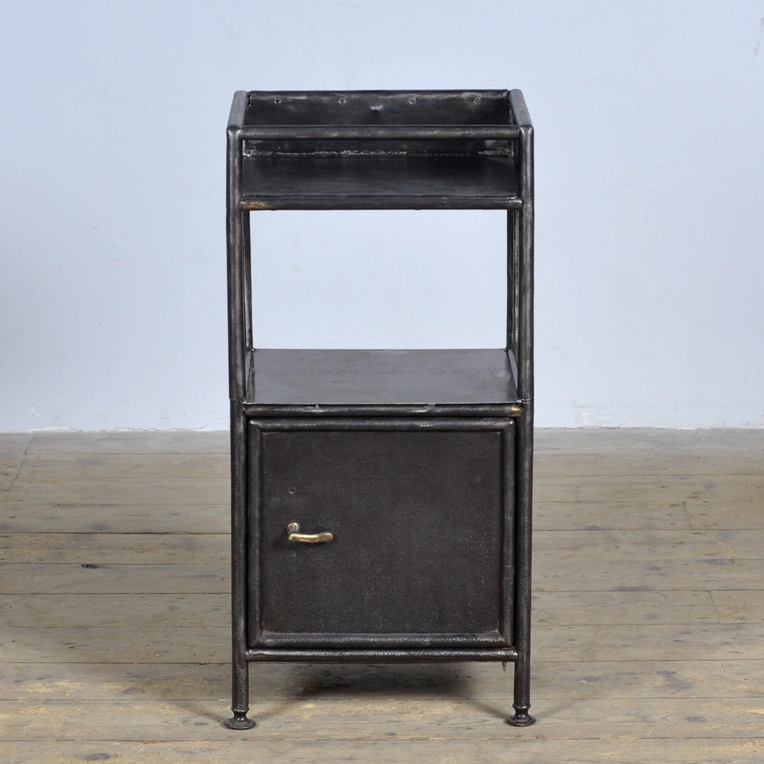 Bedside table made of iron from a hospital in Budapest. Stripped to the metal and polished. Circa 1910.