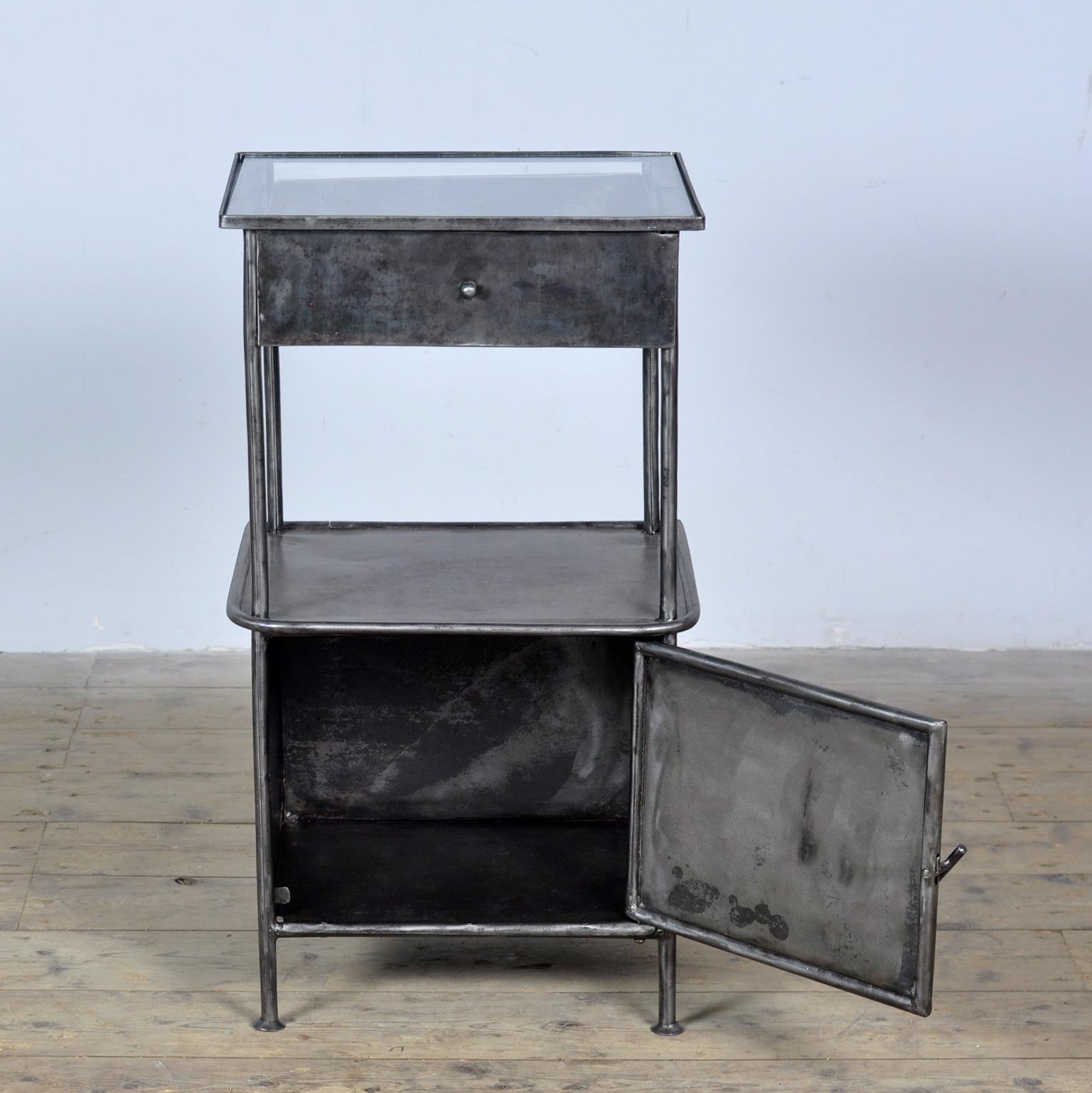 Polished Iron nightstand, 1910s For Sale