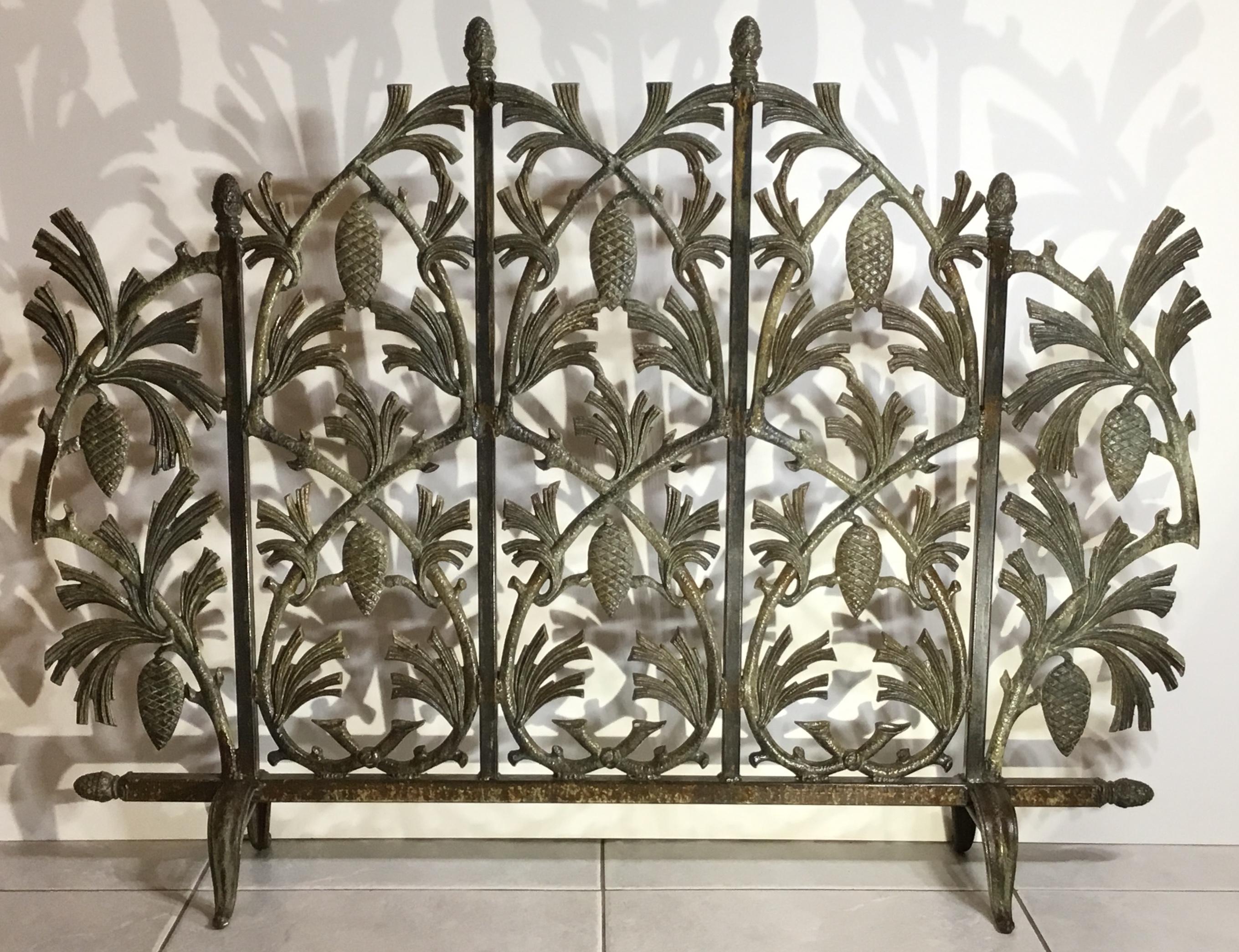 Exceptional fireplace screen made of cast iron with vines and pinecone motifs all around, beautiful patina, professionally treated and sealed for rust. great decorative object of art for the fireplace.