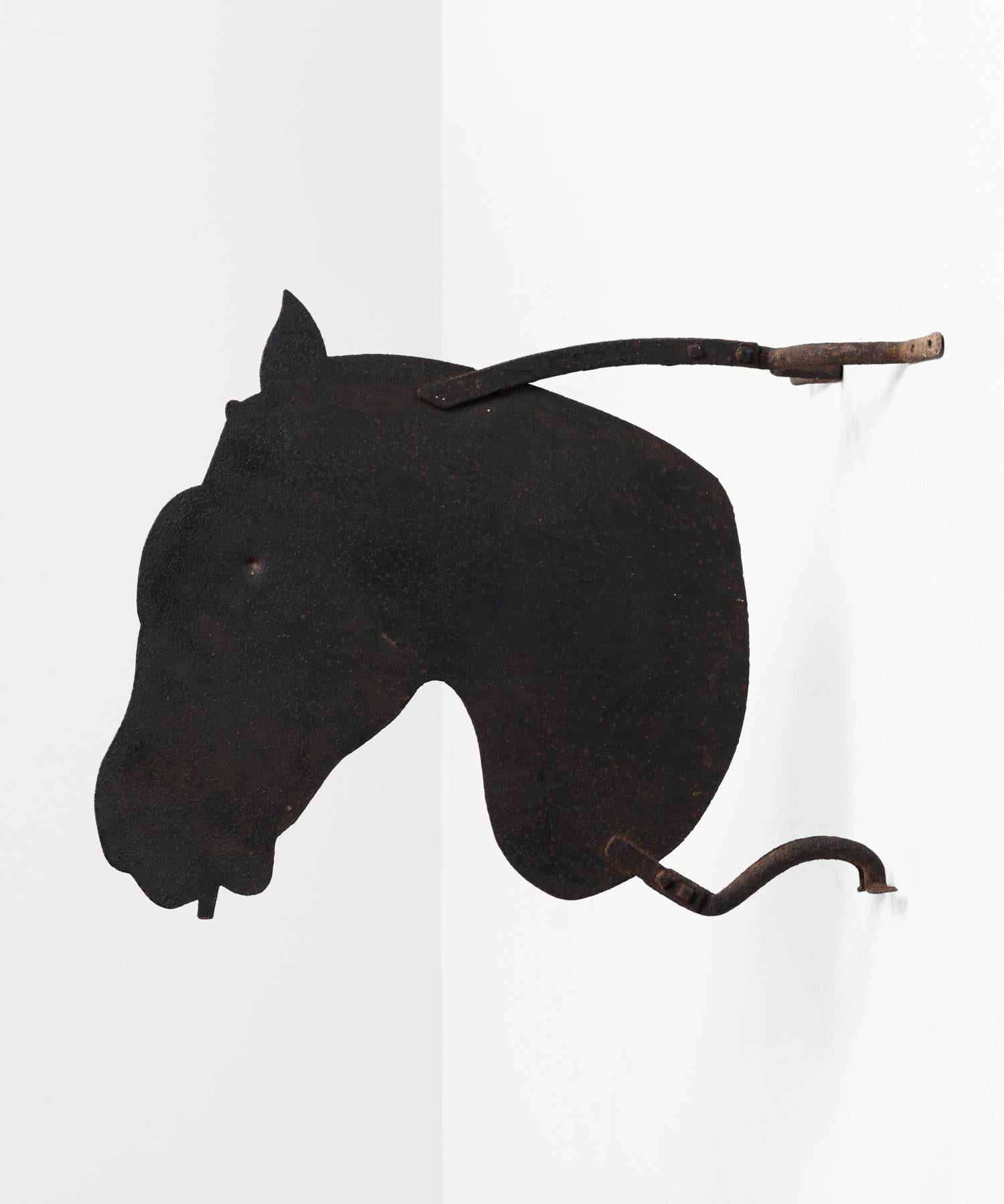 Iron saddlers horse sign, circa 1890.

Wall mounted sign made from flat iron with original mounting brackets.