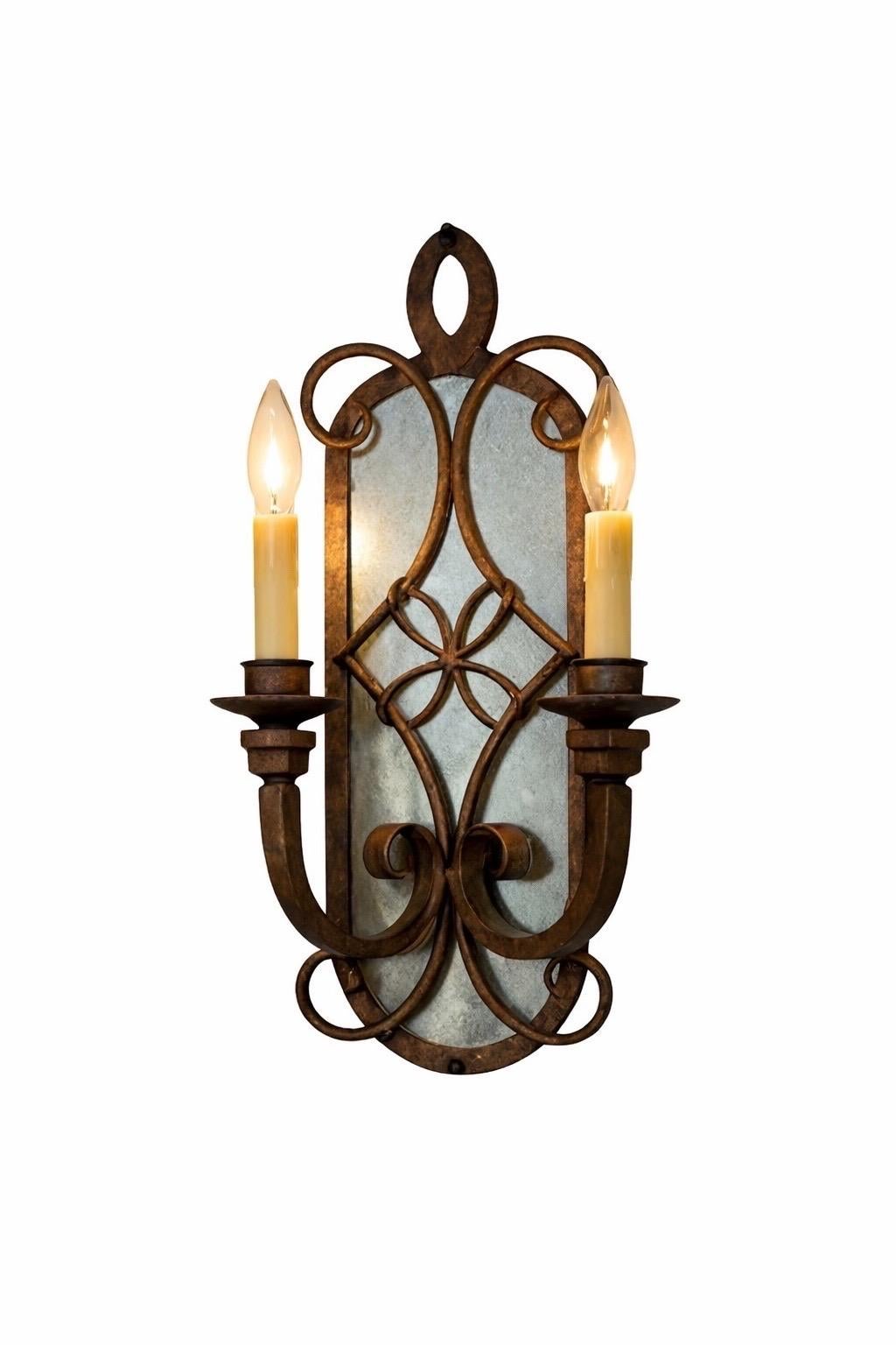 Hand-Forged Wrought Iron Wall Sconce with Dual Candle Design For Sale