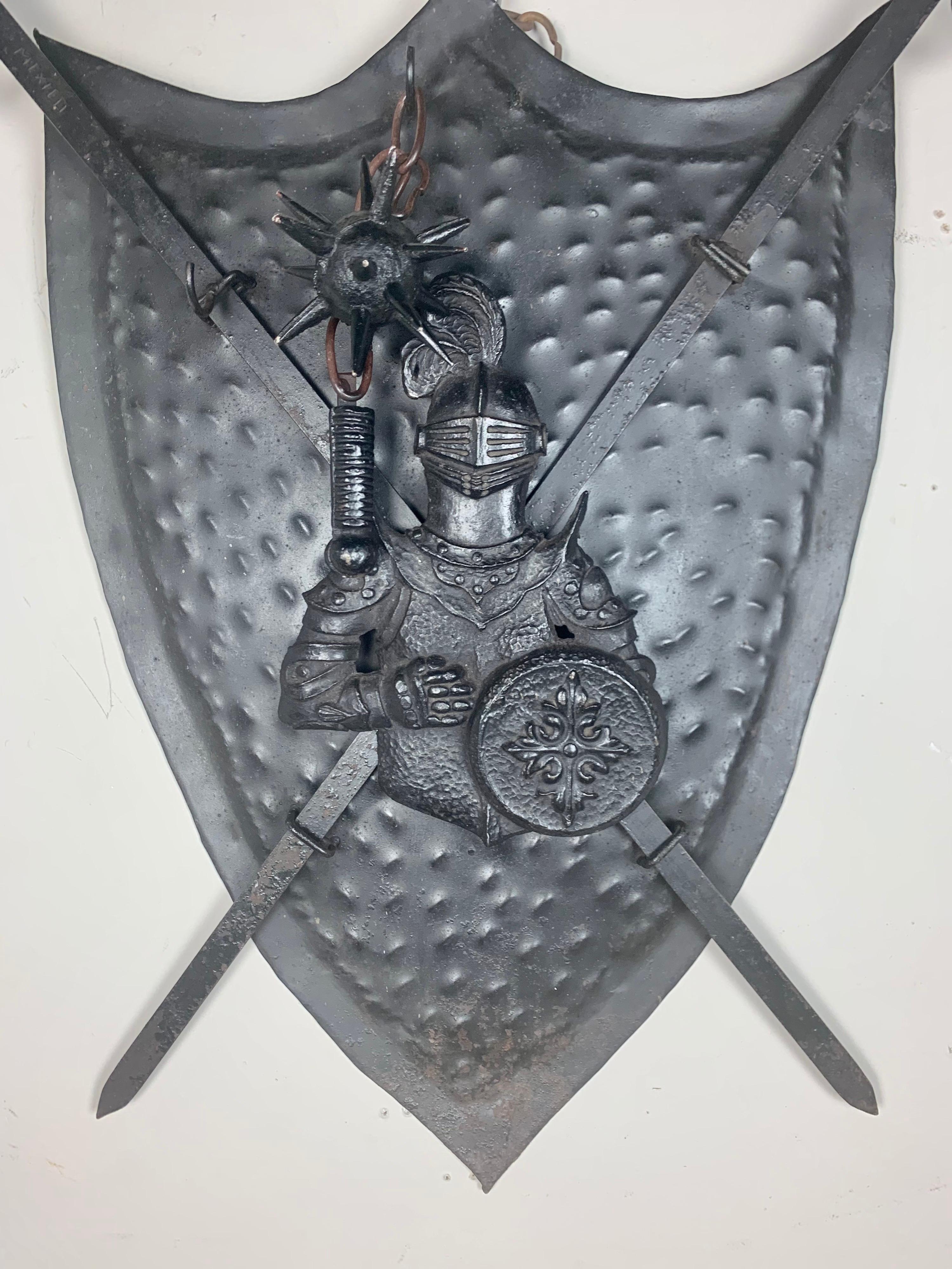 Iron Spanish shield with crossed swords, circa 1900s.
