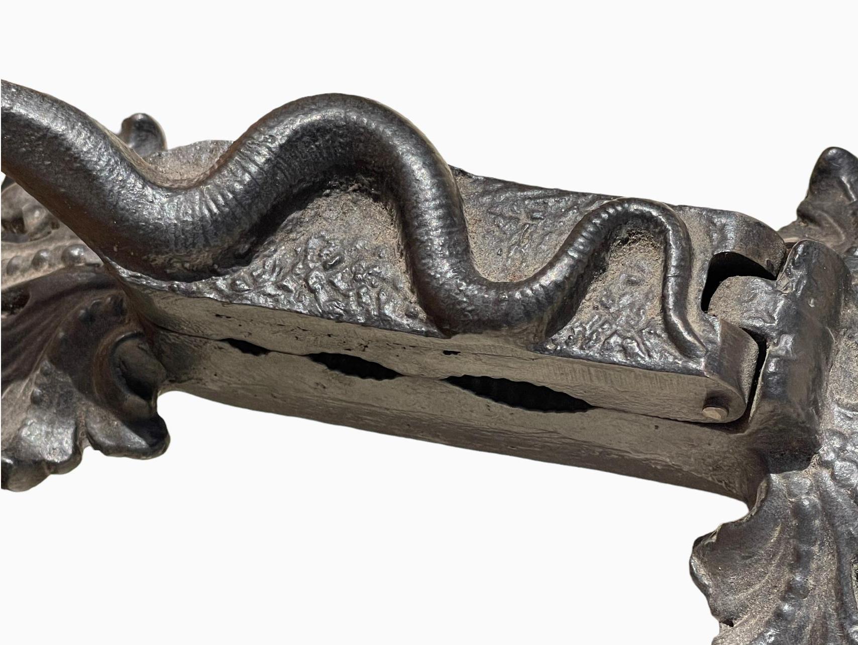 19th Century Iron Stopper With Snake Decor For Sale