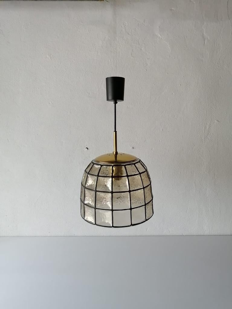 Iron structured glass pendant lamp by Limburg, 1960s, Germany

Mid-Century Modern 
Geometric iron grid design.
Iron structured glass.
Brass lampshade top part and socket. 

Lampshade is in good condition.
This lamp works with one E27 light