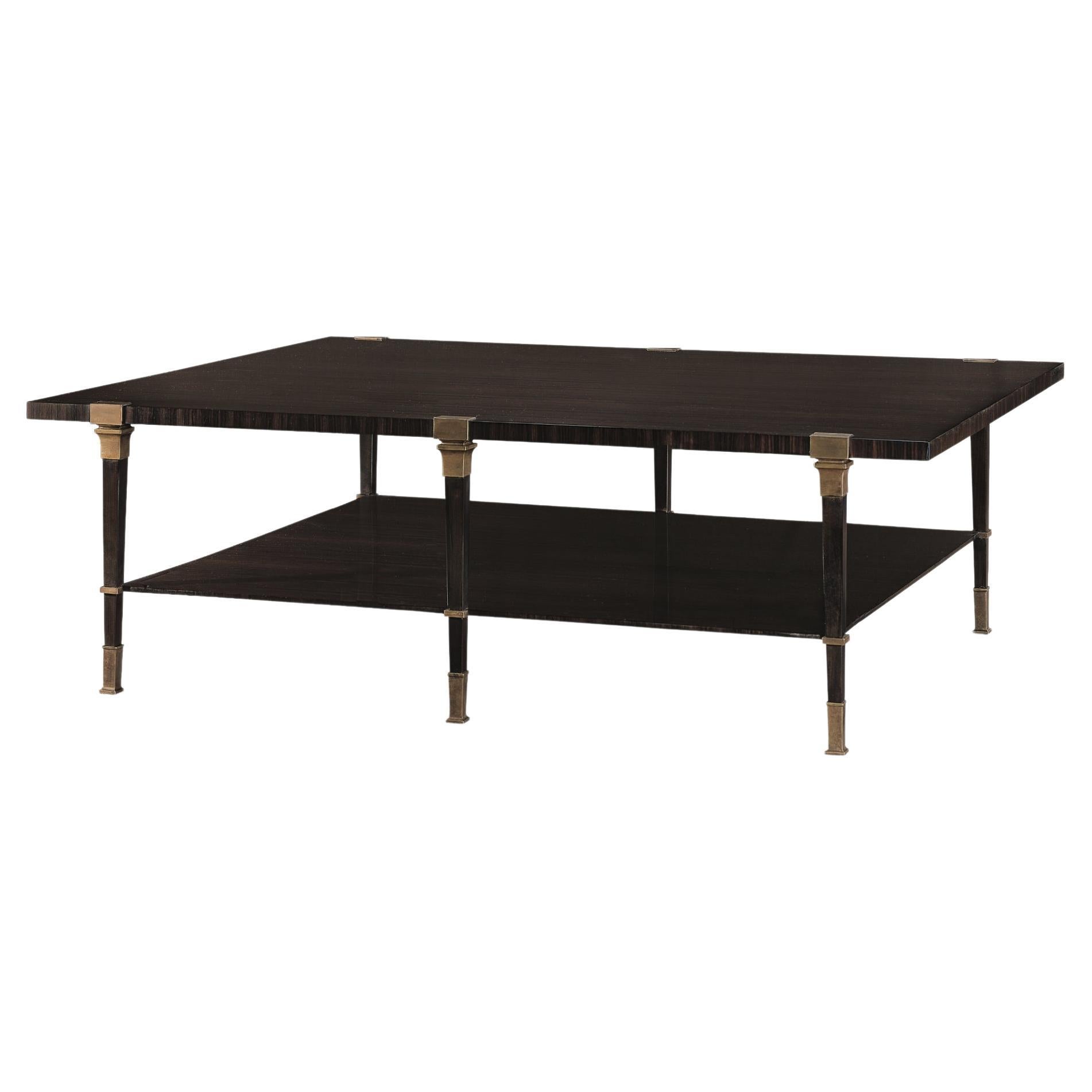 Iron structured Louviers cocktail table with ebonized top, brass caps & details For Sale