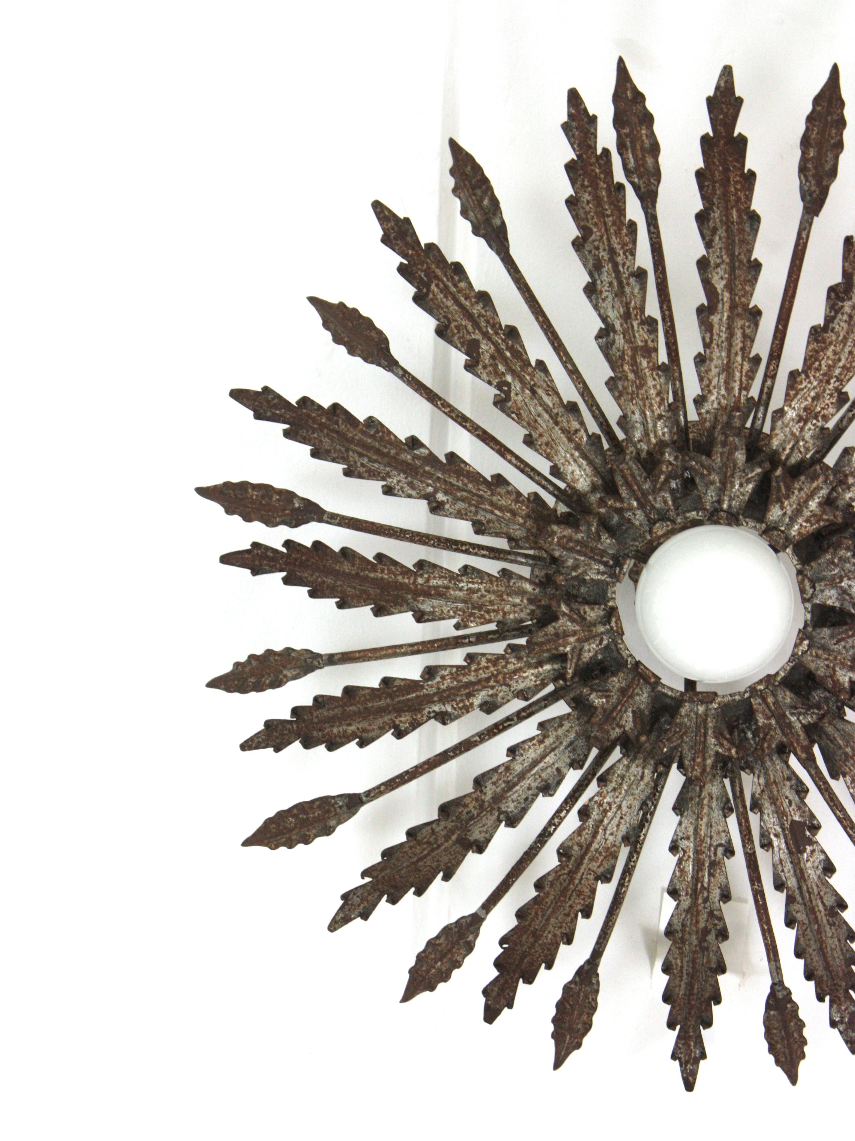 Iron Sunburst Ceiling Light Fixture with Leaves Design and Rusty Patina For Sale 4