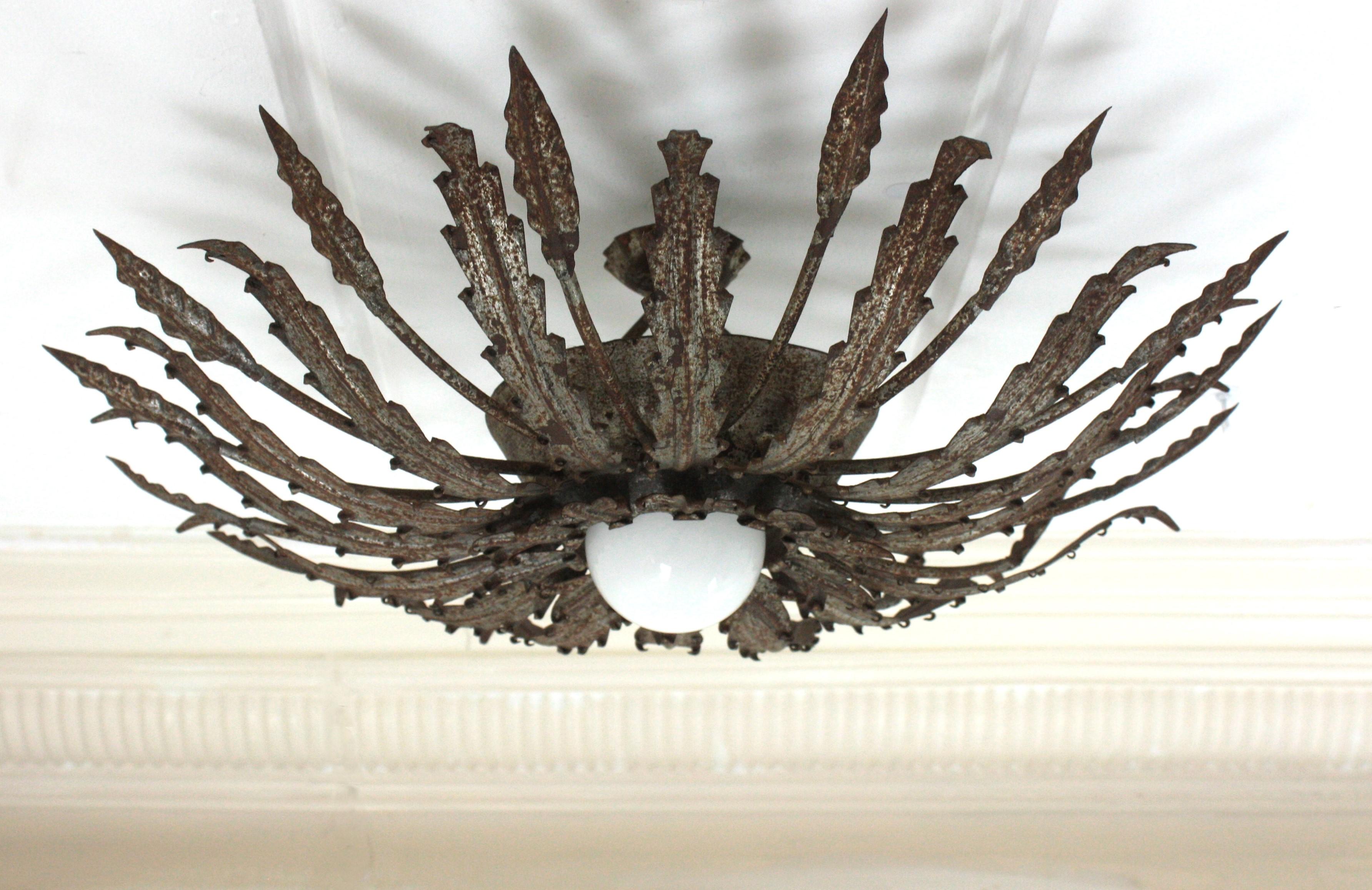 Iron Sunburst Ceiling Light Fixture with Leaves Design and Rusty Patina For Sale 6