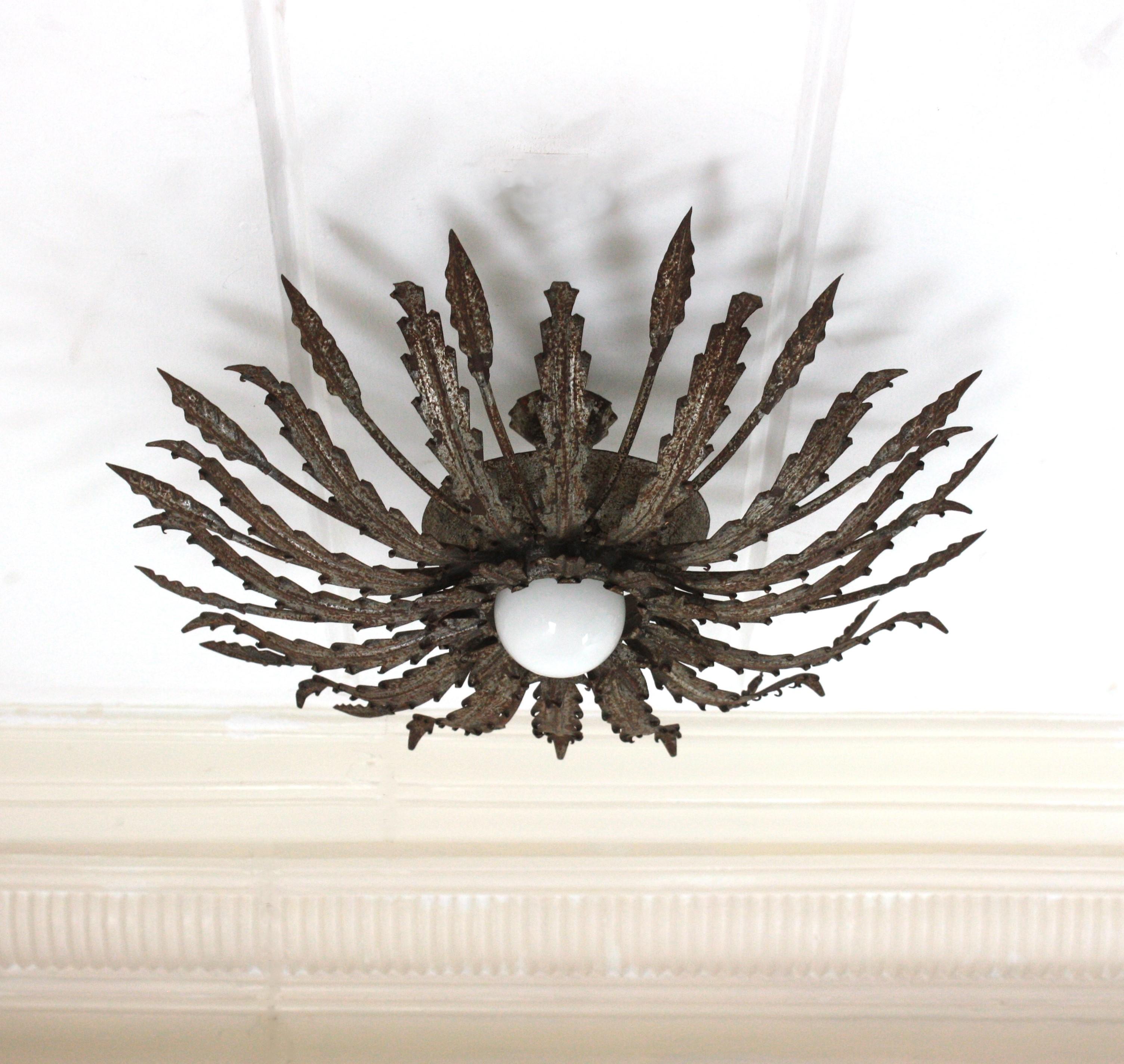 Iron Sunburst Ceiling Light Fixture with Leaves Design and Rusty Patina For Sale 7