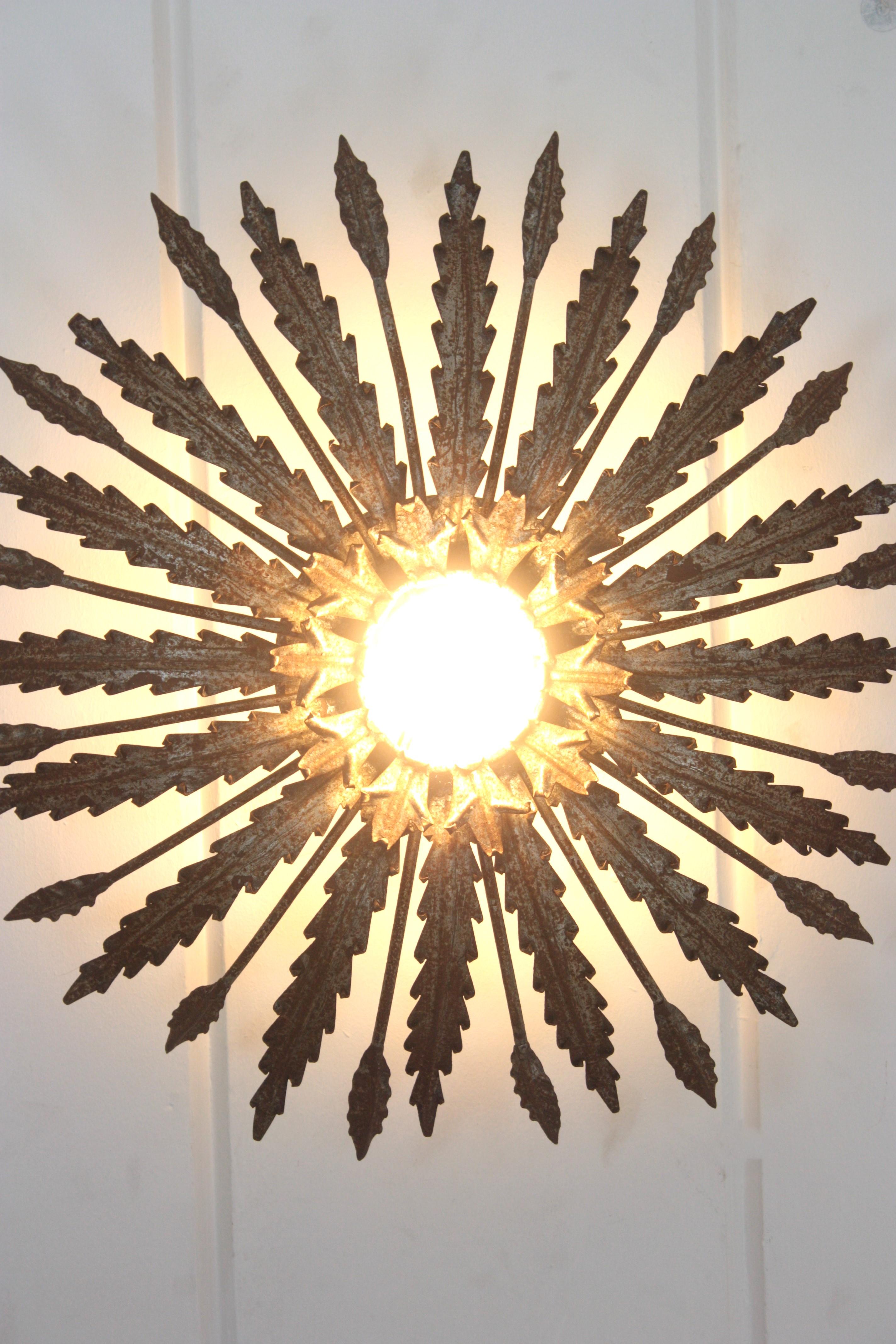 Iron Sunburst Ceiling Light Fixture with Leaves Design and Rusty Patina For Sale 11