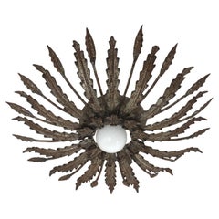 Iron Sunburst Ceiling Light Fixture with Leaves Design and Rusty Patina