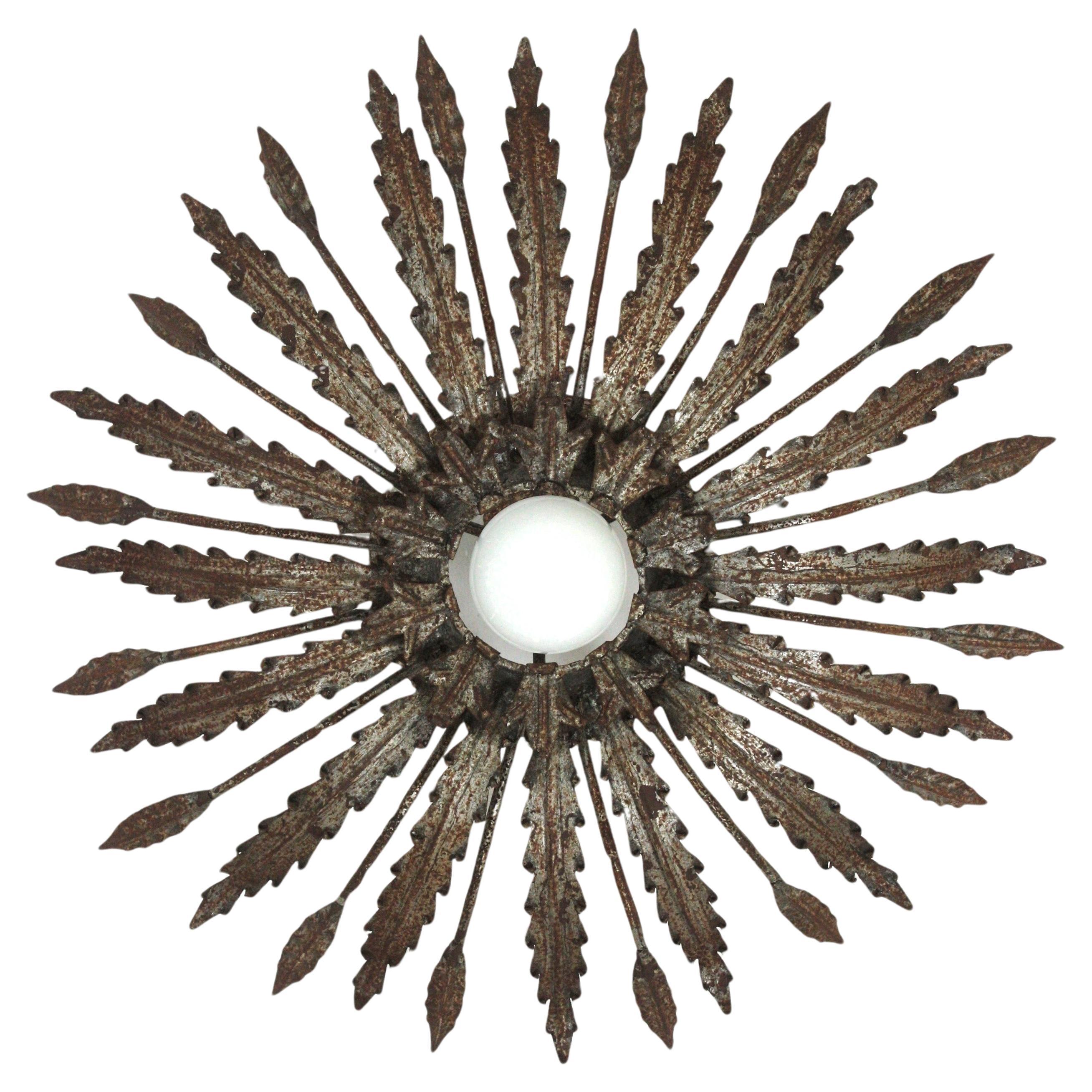 Iron Sunburst Ceiling Light Fixture with Leaves Design and Rusty Patina