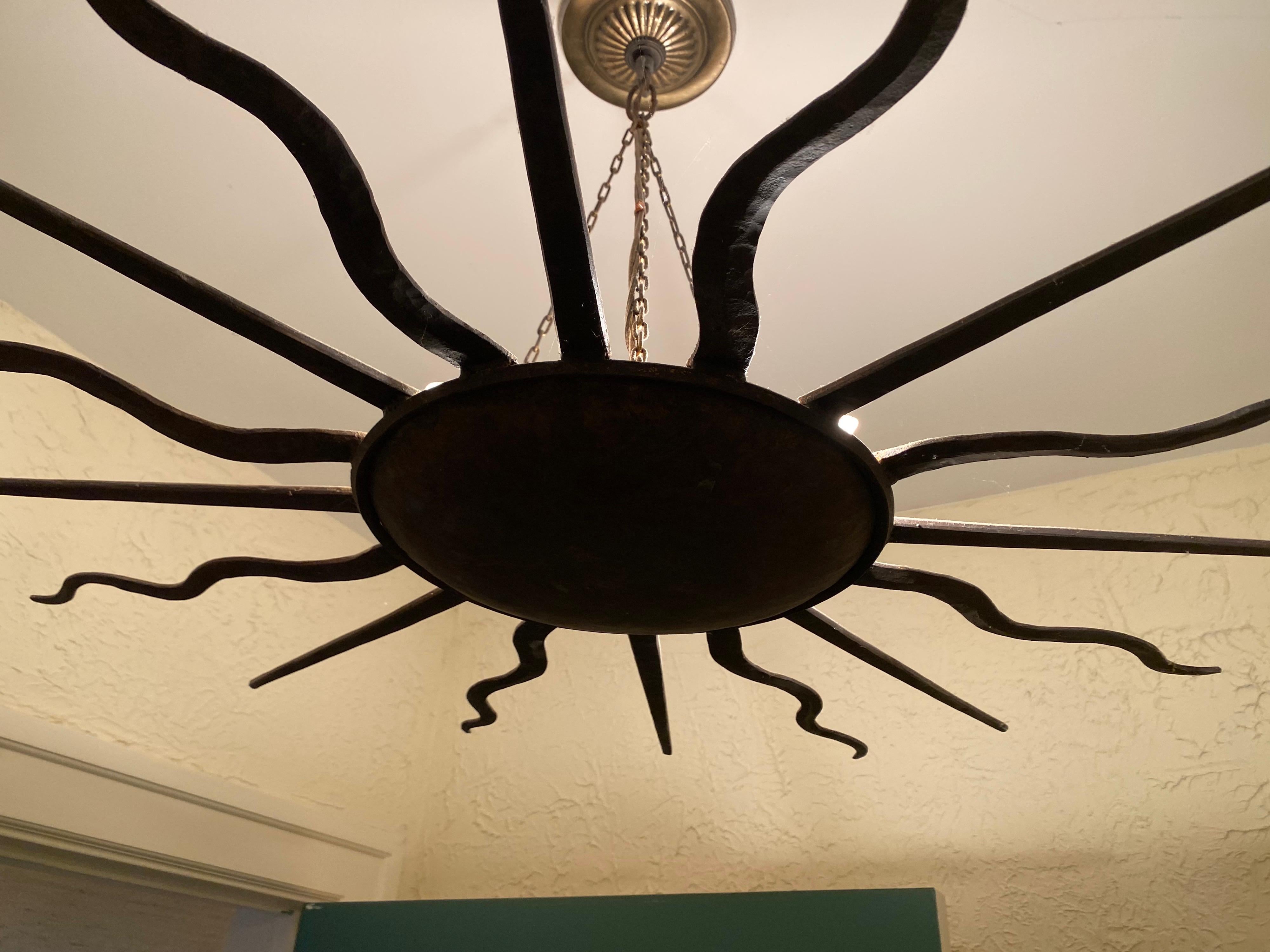Iron Sunburst Chandelier, 20th Century In Good Condition In Southampton, NY