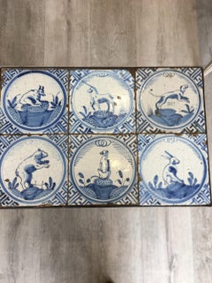 Iron Table with Six 17th Century Delft Animal Tiles