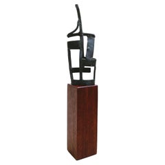 Iron Torso Sculpture on Red Lacquered Wooden Base