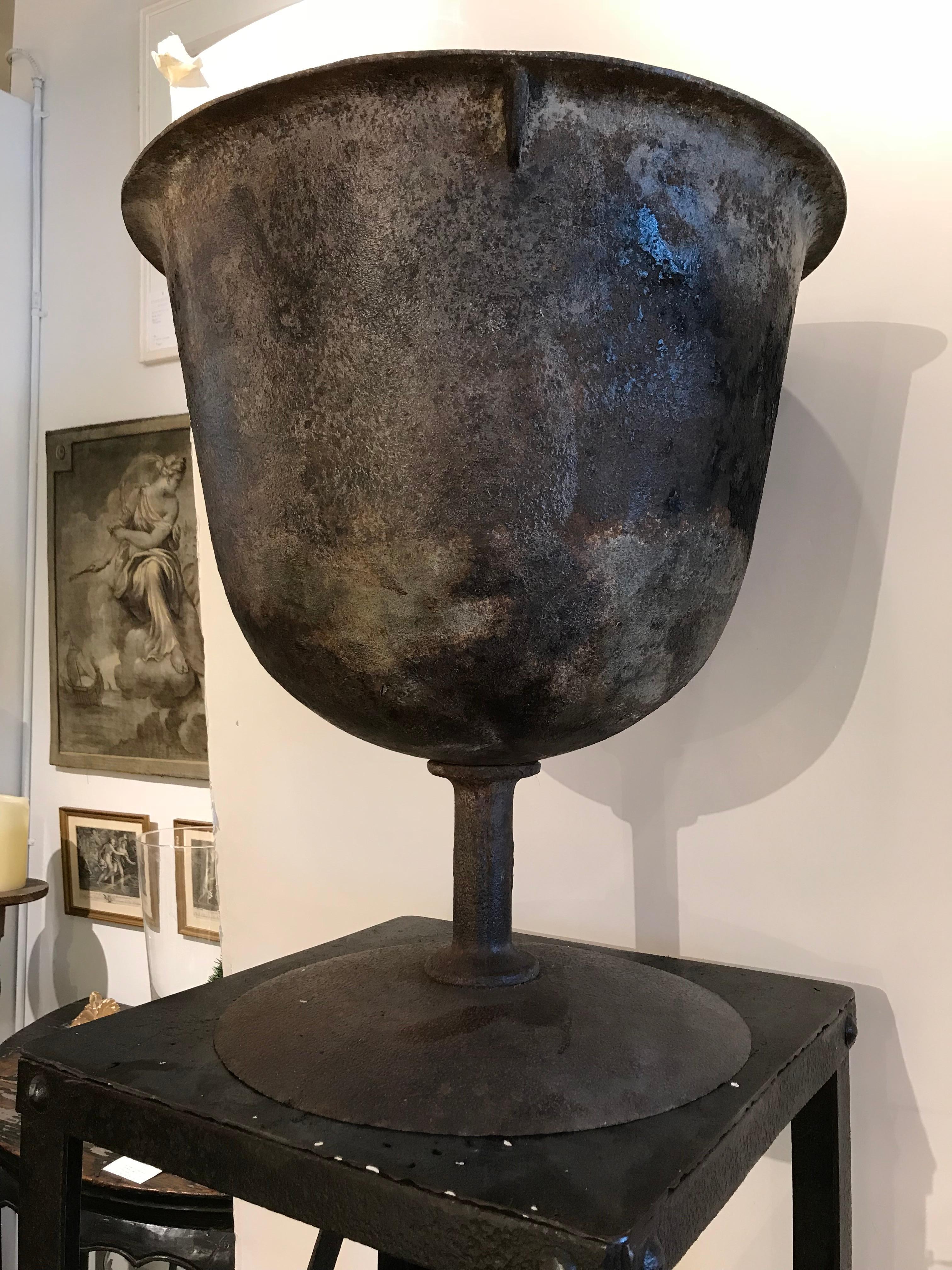 Iron urn and stand, circa 1900--sold and priced as set only.

Measures: stand 54” H x 24.5” D x 24.5” W (at base)
urn 23.5” diameter x 21.75” height.