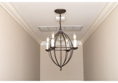 Iron Ware International Elongated Spherical Pendant With Four Lights