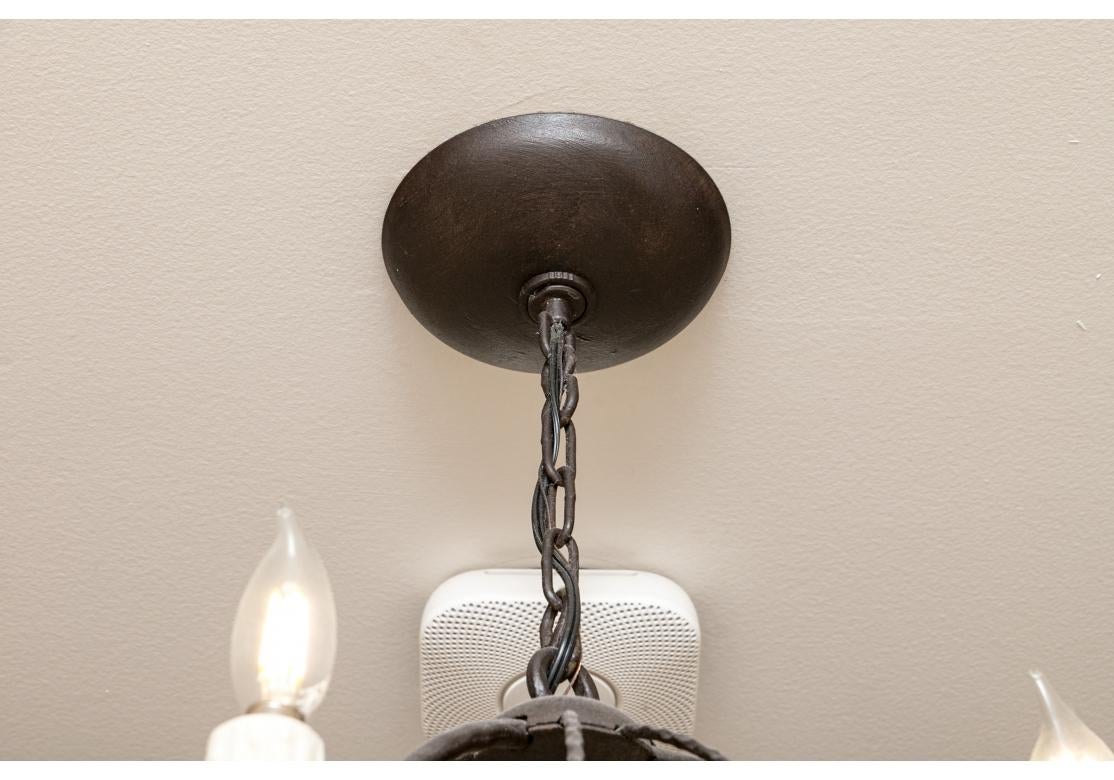 American Iron Ware International Elongated Spherical Pendant With Four Lights For Sale