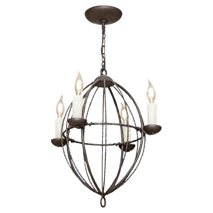 Iron Ware International - Pendentif sphérique allongé avec quatre Lights en vente