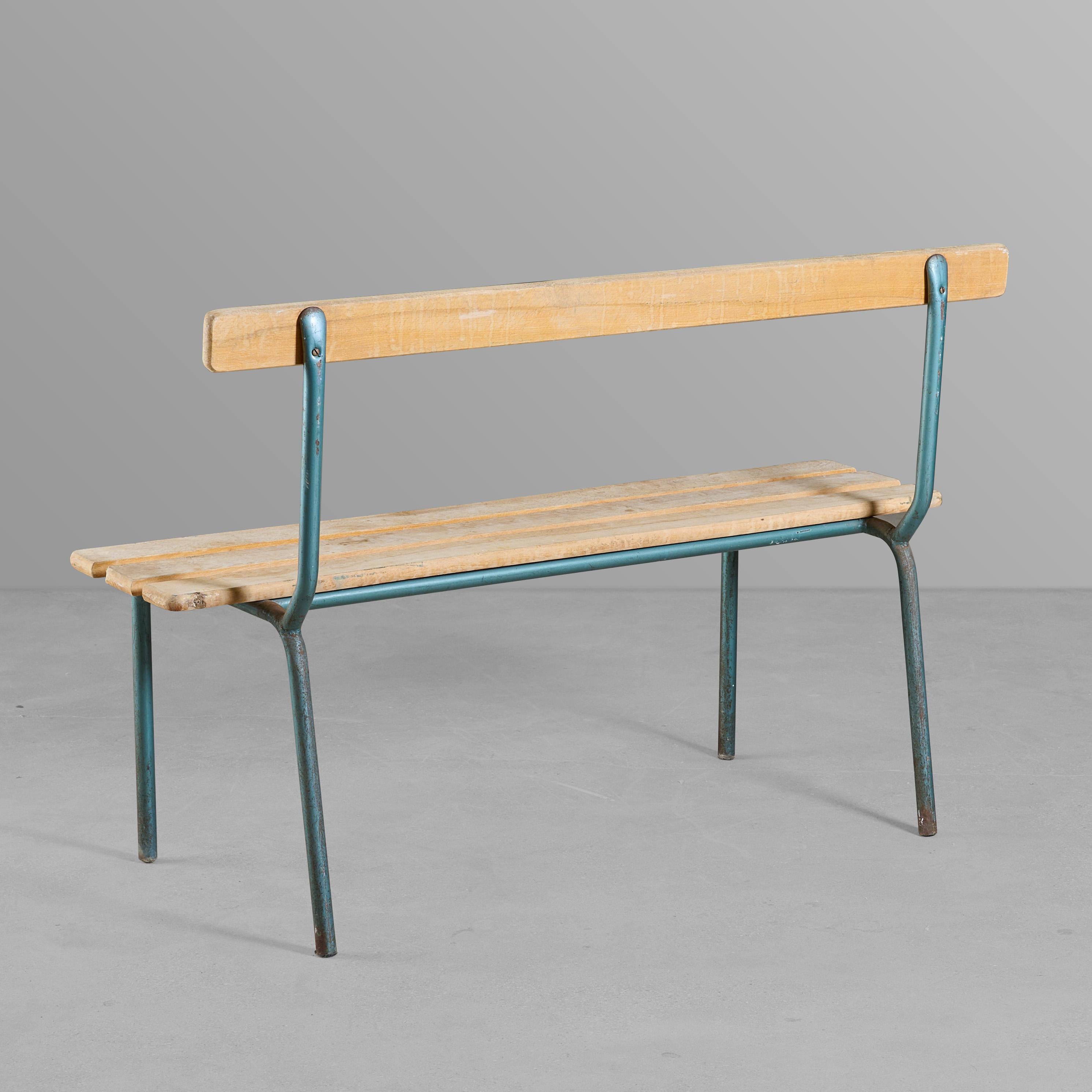 Iron and wood slat bench. For interior or exterior. Nice simple design.