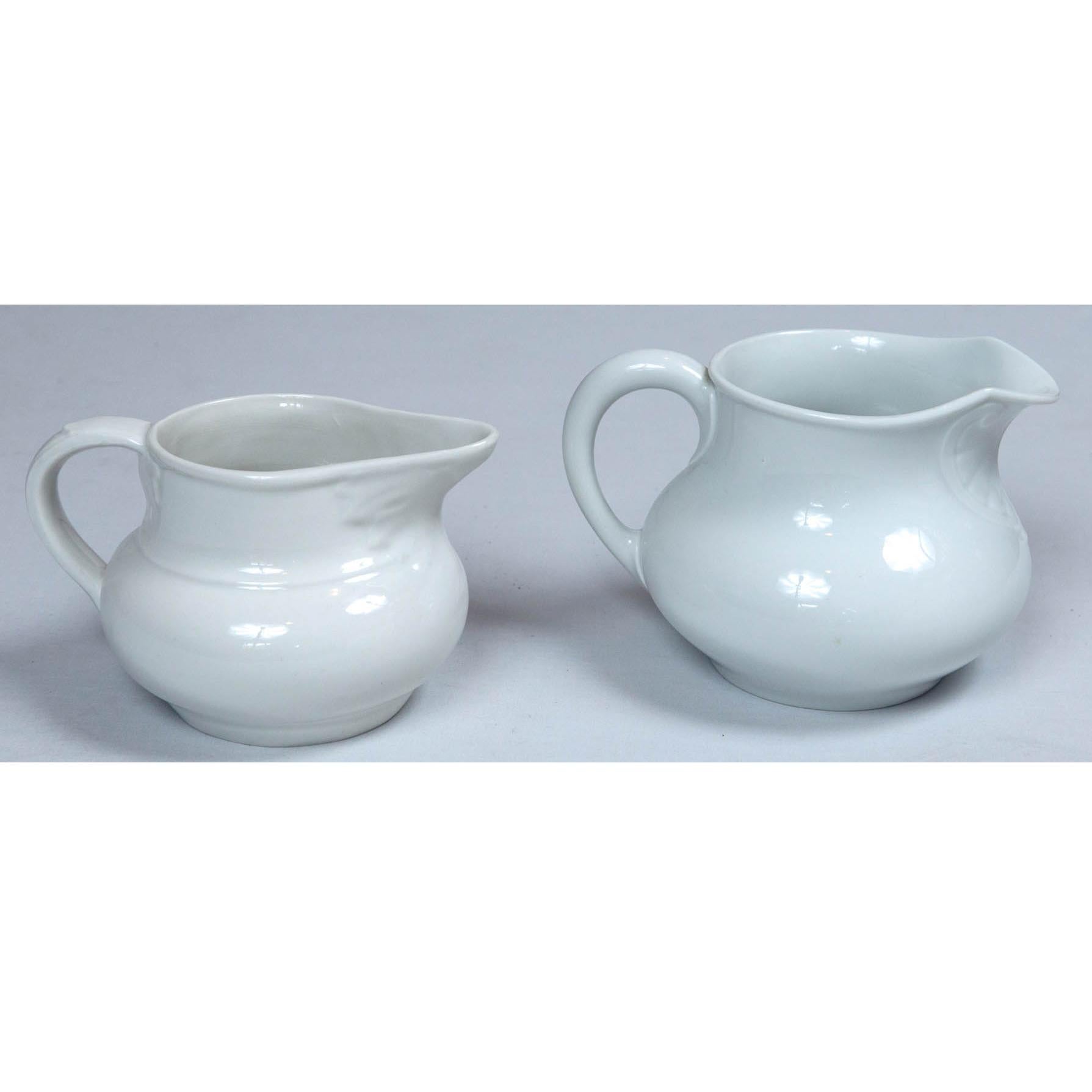 Ironstone dairy pitchers, France, circa 1900. Elegant Art Nouveau style. Priced individually. Smaller size pitcher available.
