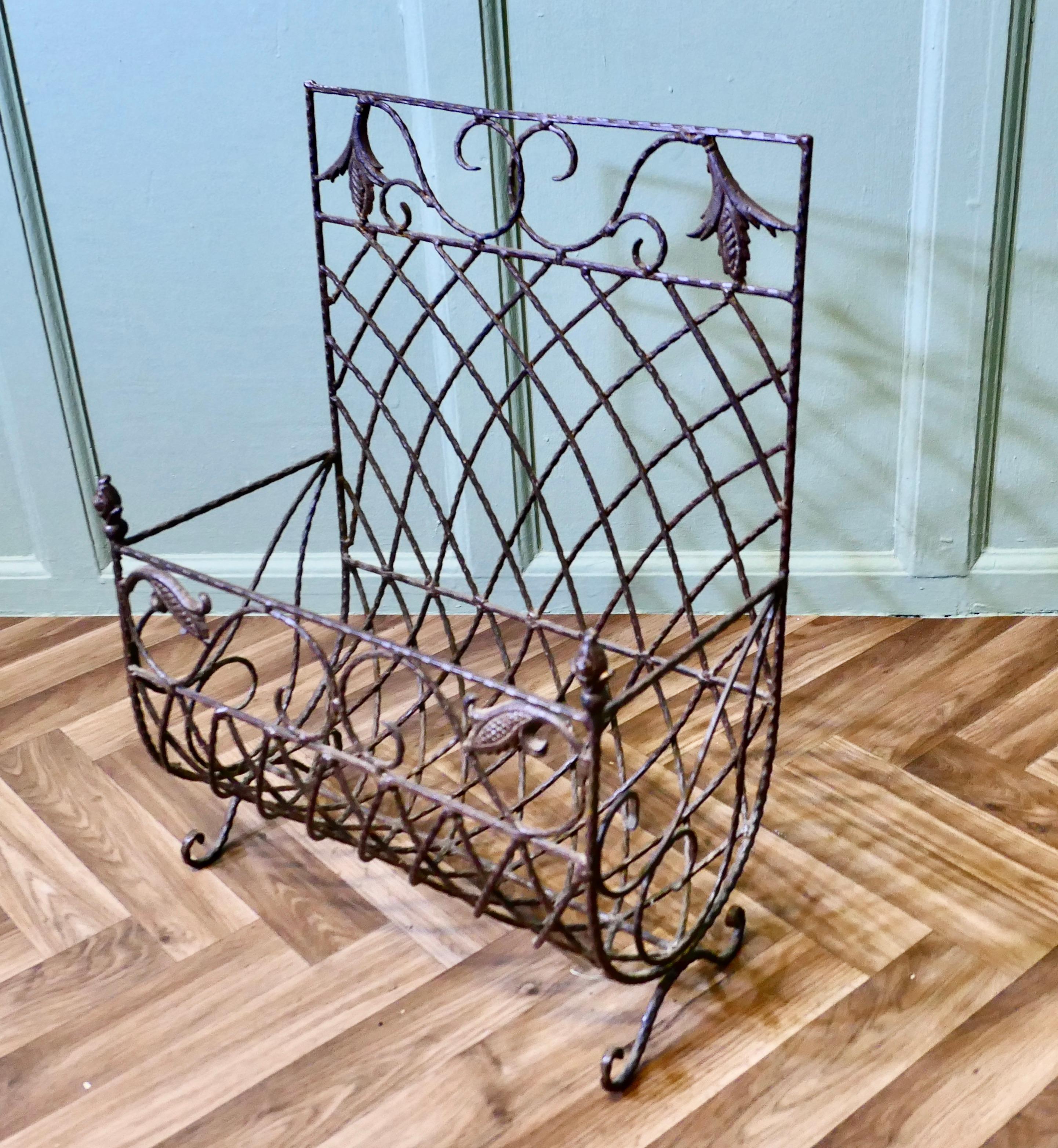Arts and Crafts Ironwork Log Basket  An unusual piece with tolewear decoration For Sale