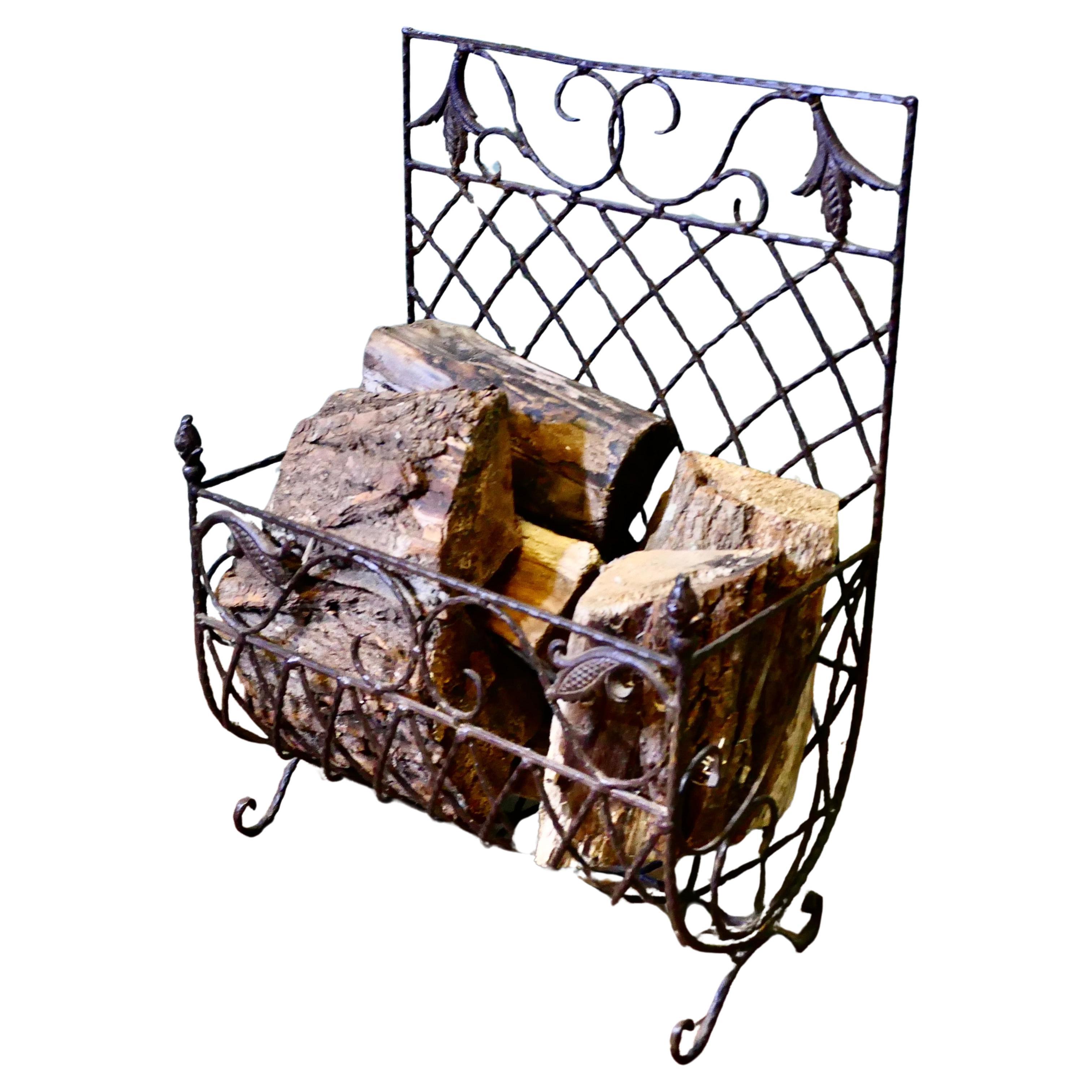 Ironwork Log Basket  An unusual piece with tolewear decoration For Sale