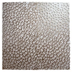 Óvalos irregulares enhebrados Una escultura textil contemporánea